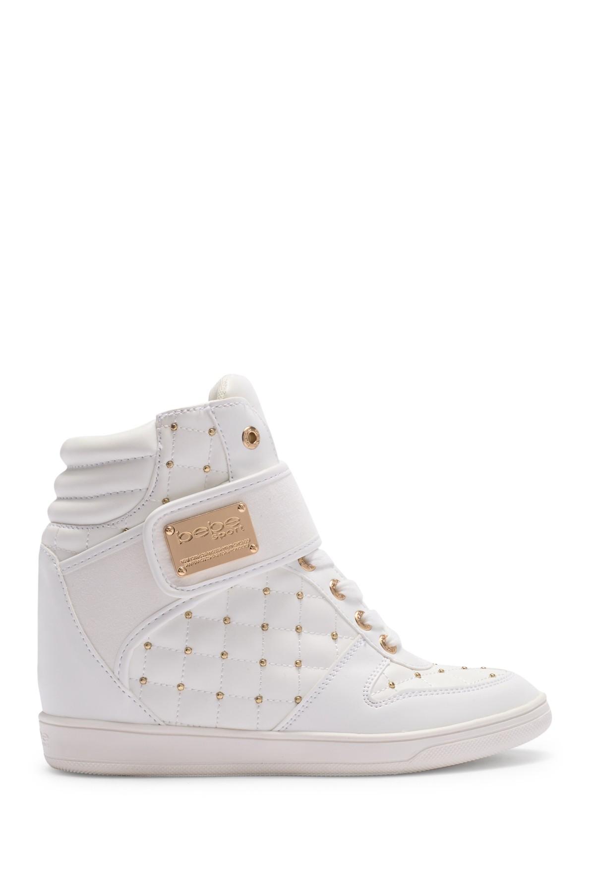Bebe Studded High Top Wedge Sneaker In White Lyst Bebe Studded High Top Wedge Sneaker In White Lyst