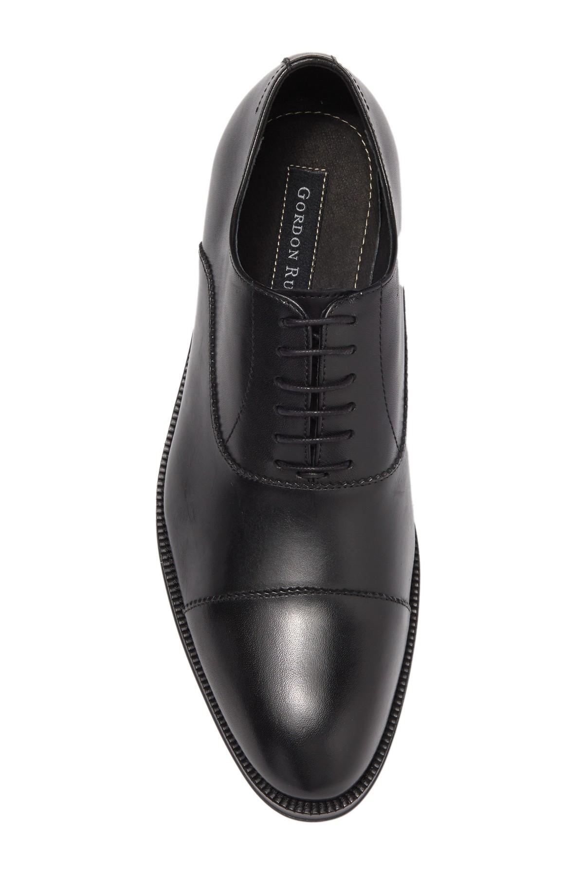 gordon rush medallion cap toe derby