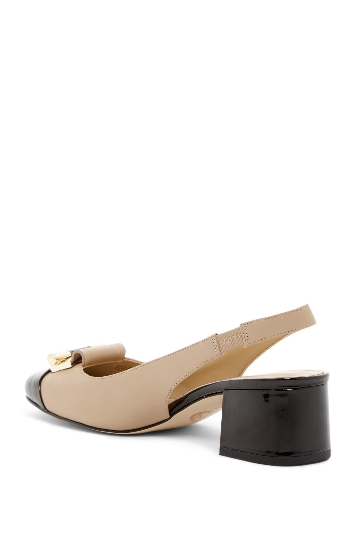 cap toe sling back heels