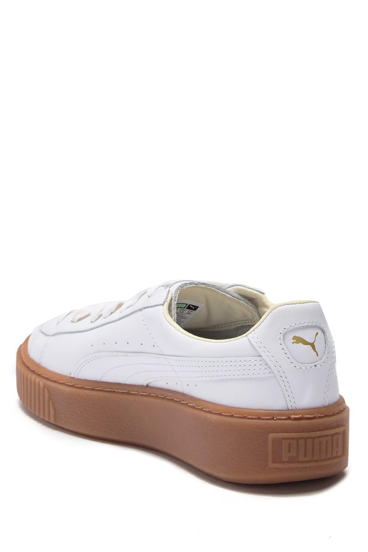 womens puma white basket leather trainers