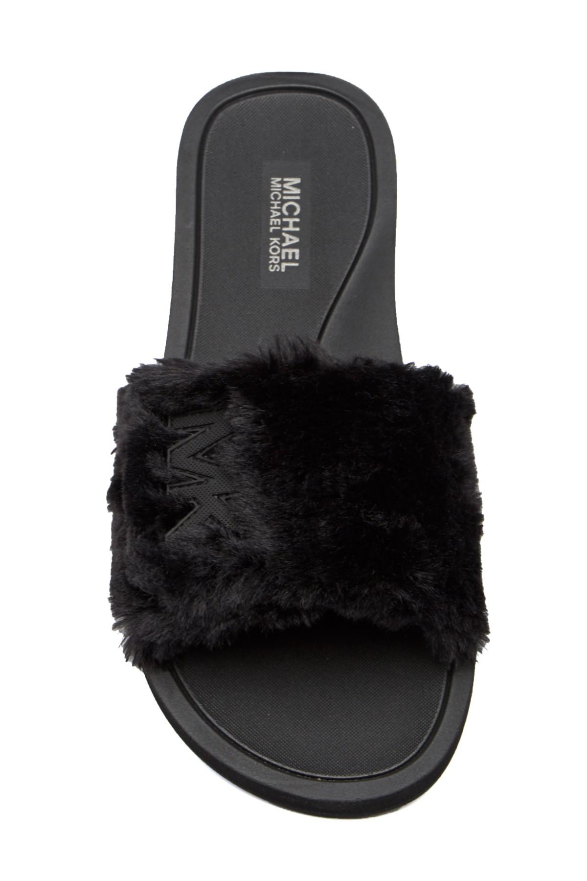 mk faux fur slides