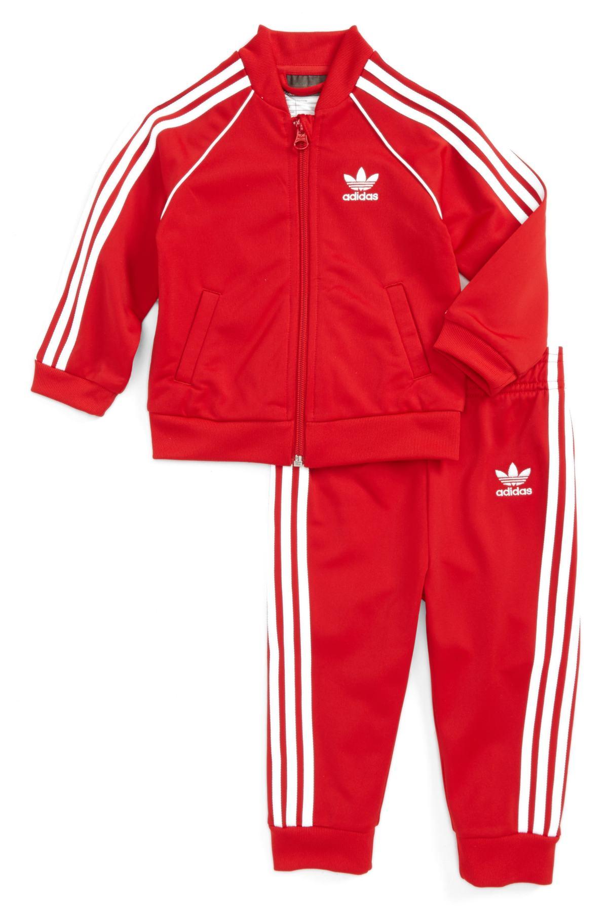 red adidas jacket and pants