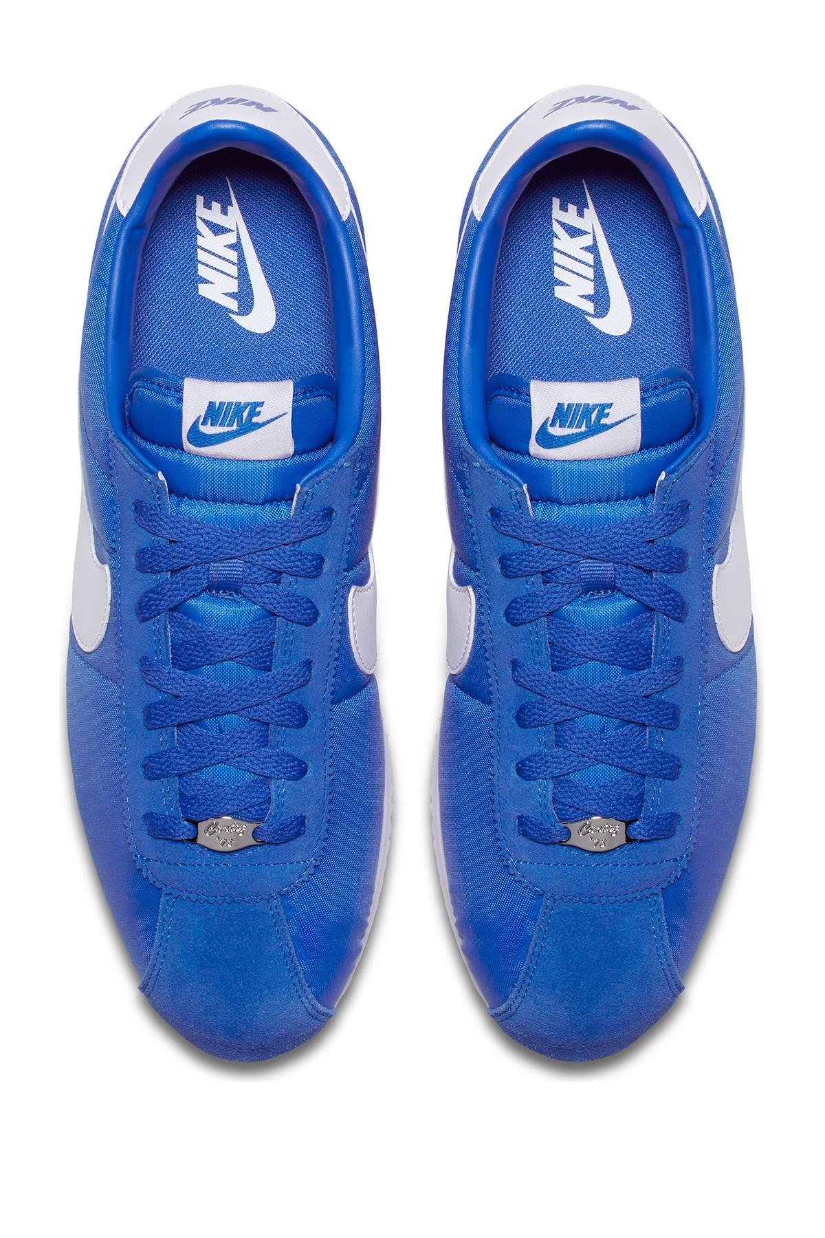 signal blue nike cortez