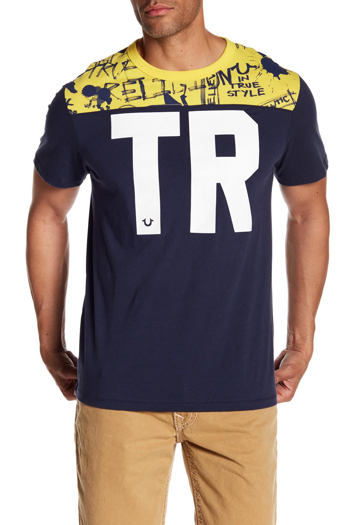 blue and yellow true religion shirt