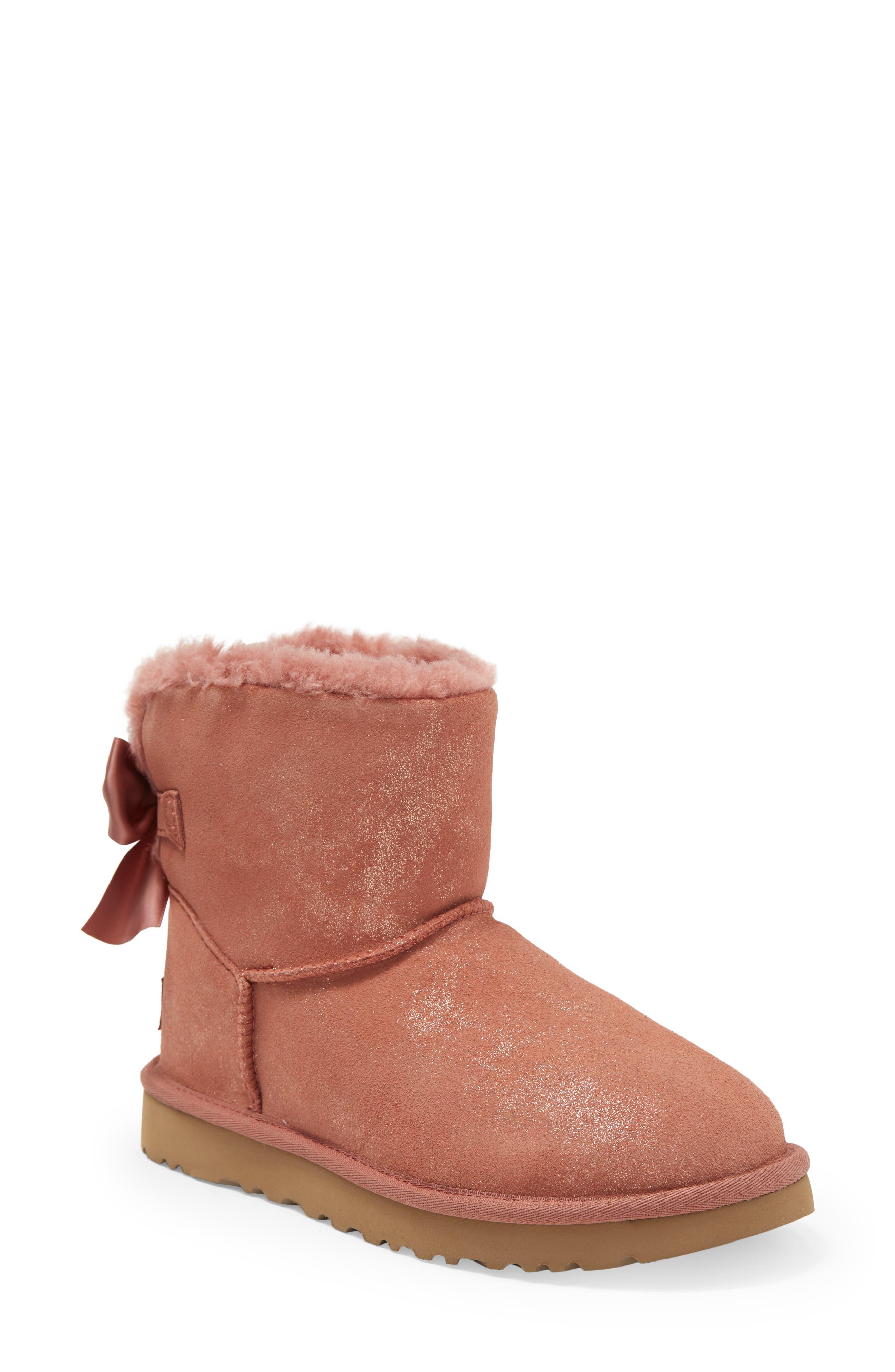 UGG Mini Bailey Bow Glimmer Faux Fur Lined Boot in Brown | Lyst