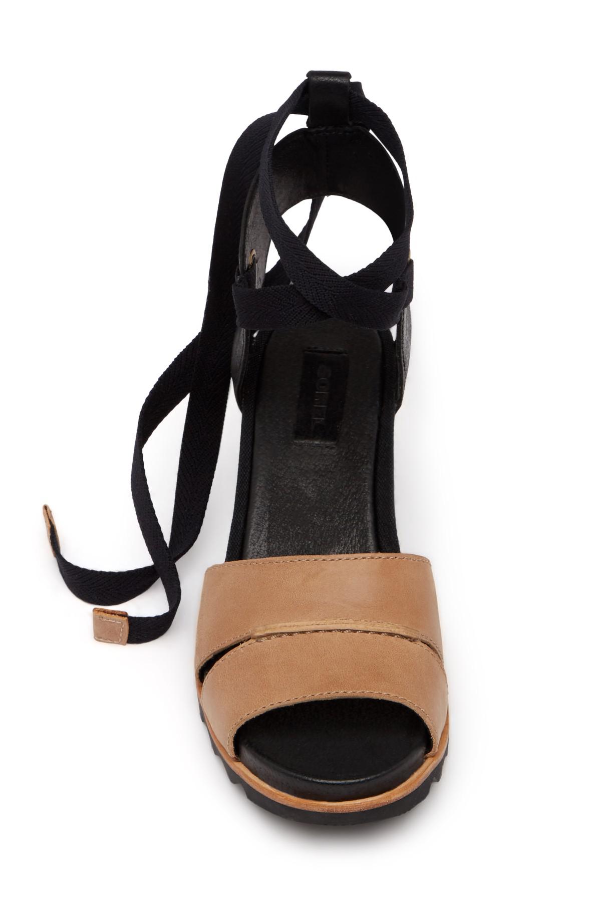 Sorel Joanie Wrap Leather Wedge Sandal in Black - Lyst