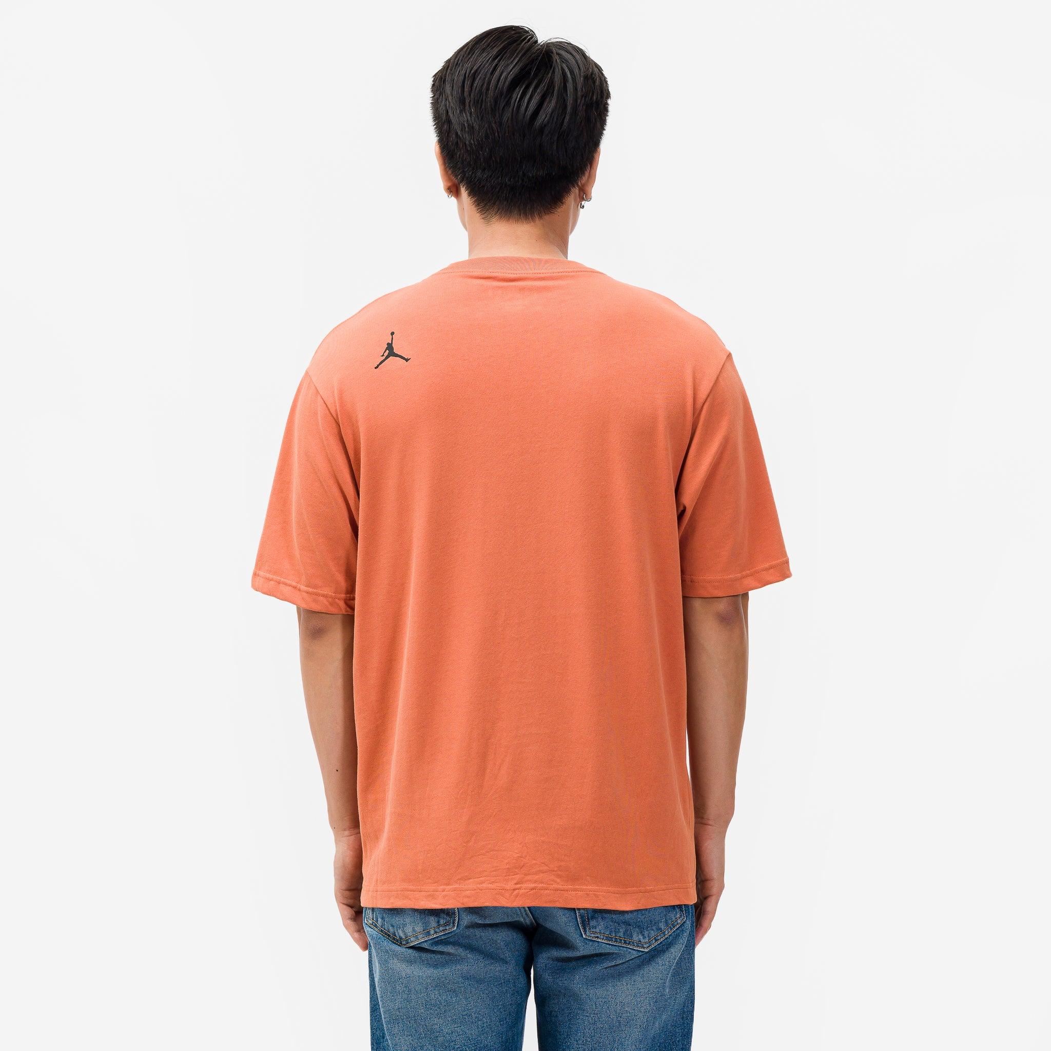 orange nike graphic tee