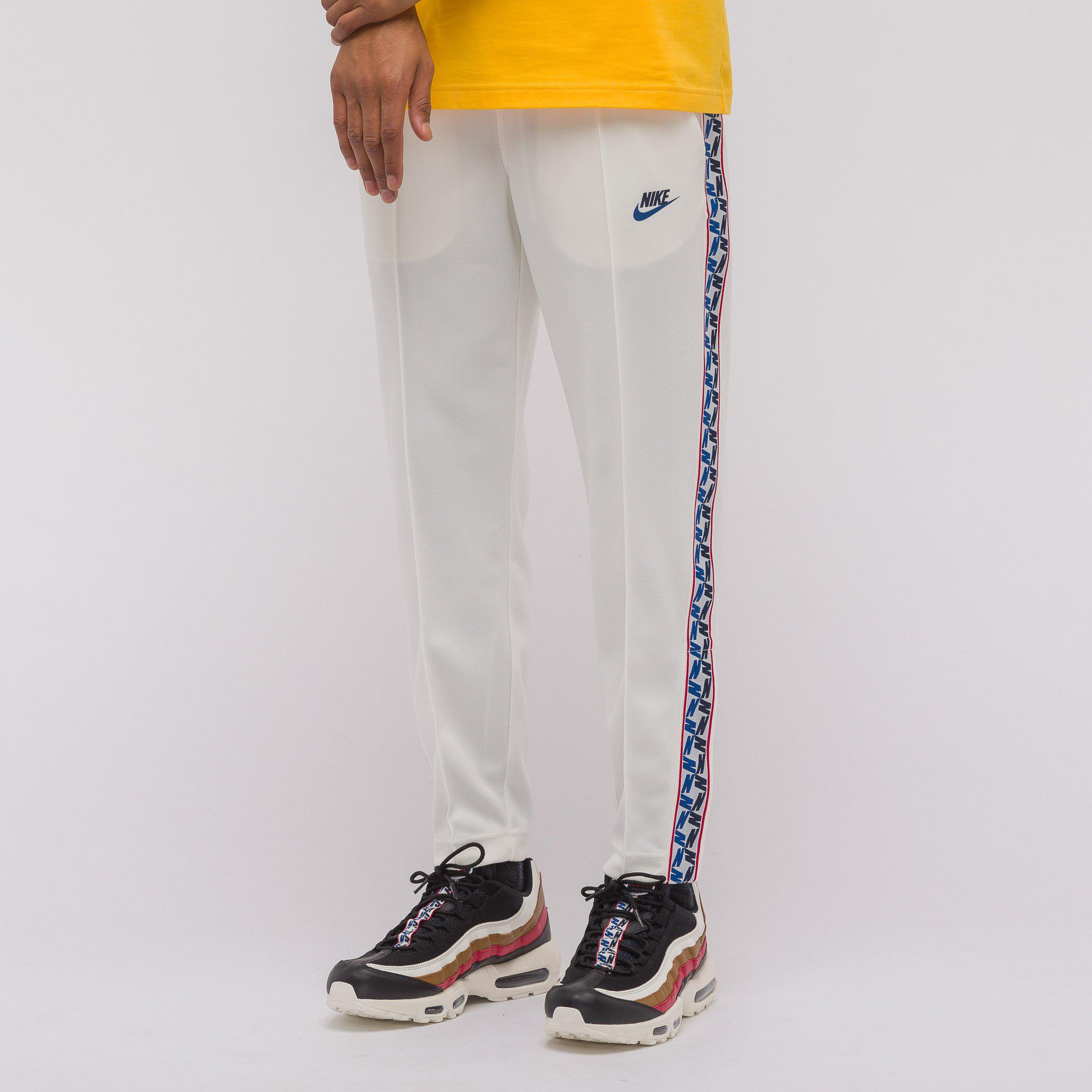 nike taped poly track pant