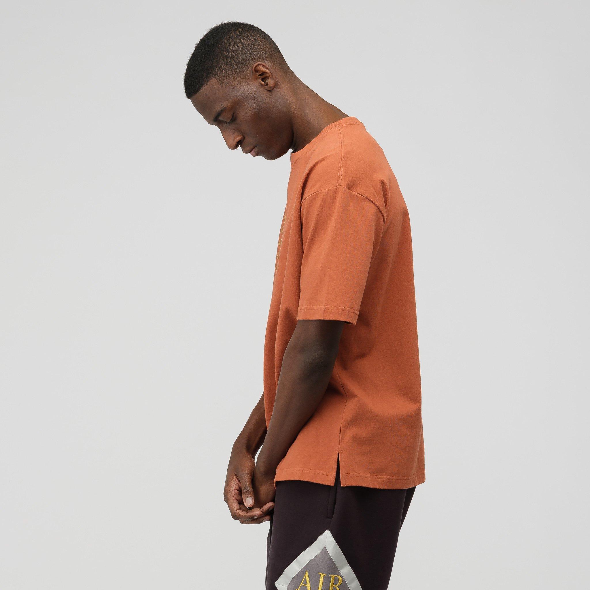 dusty peach nike shirt
