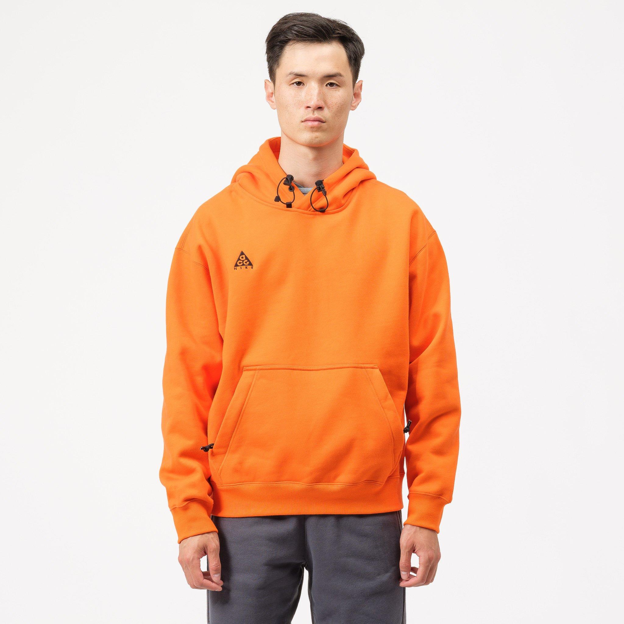 black nike hoodie with orange square