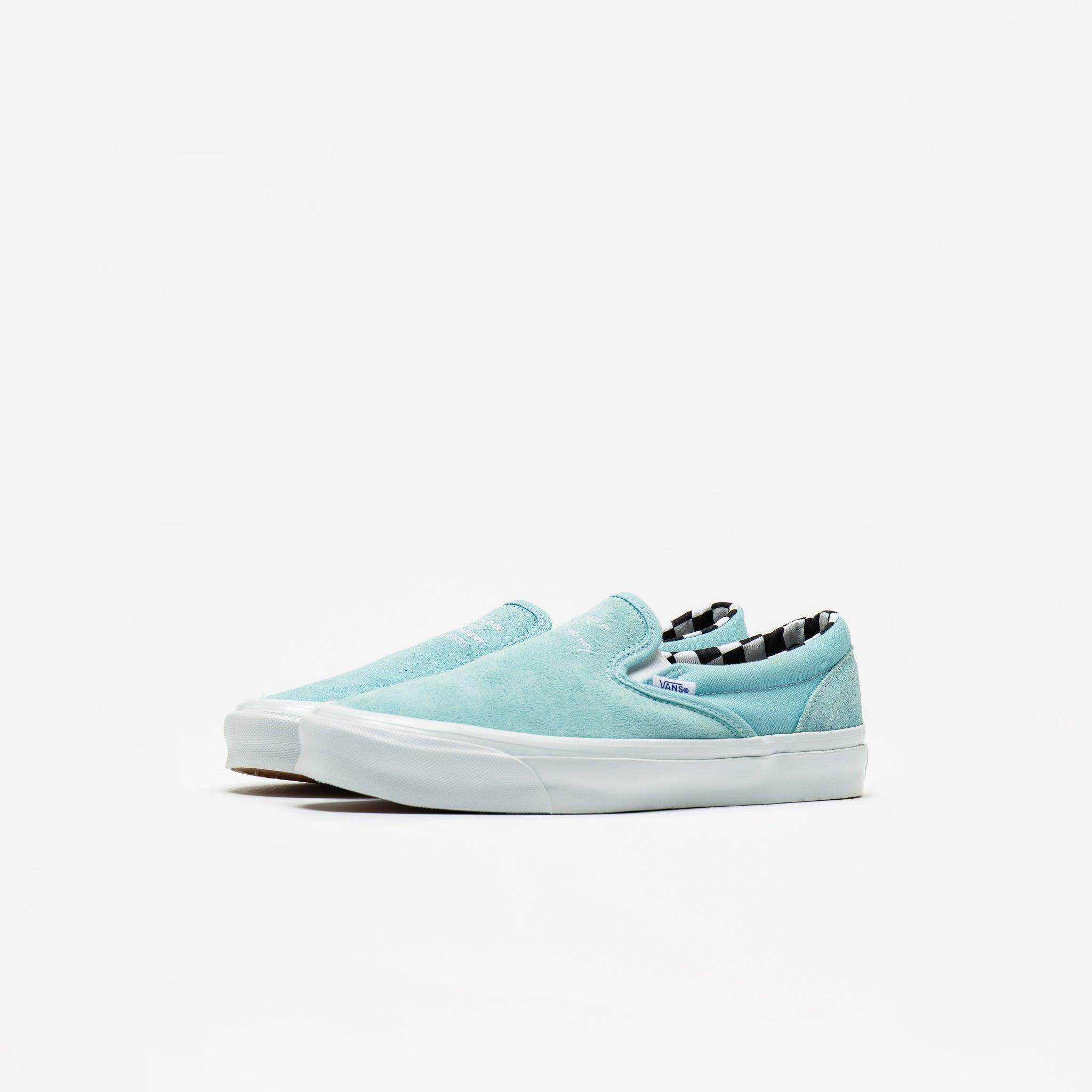 light blue canvas vans