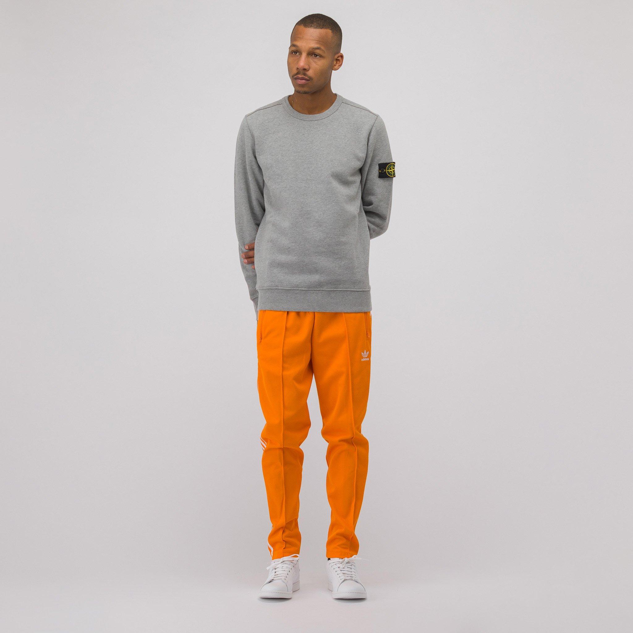 adidas beckenbauer track pants orange