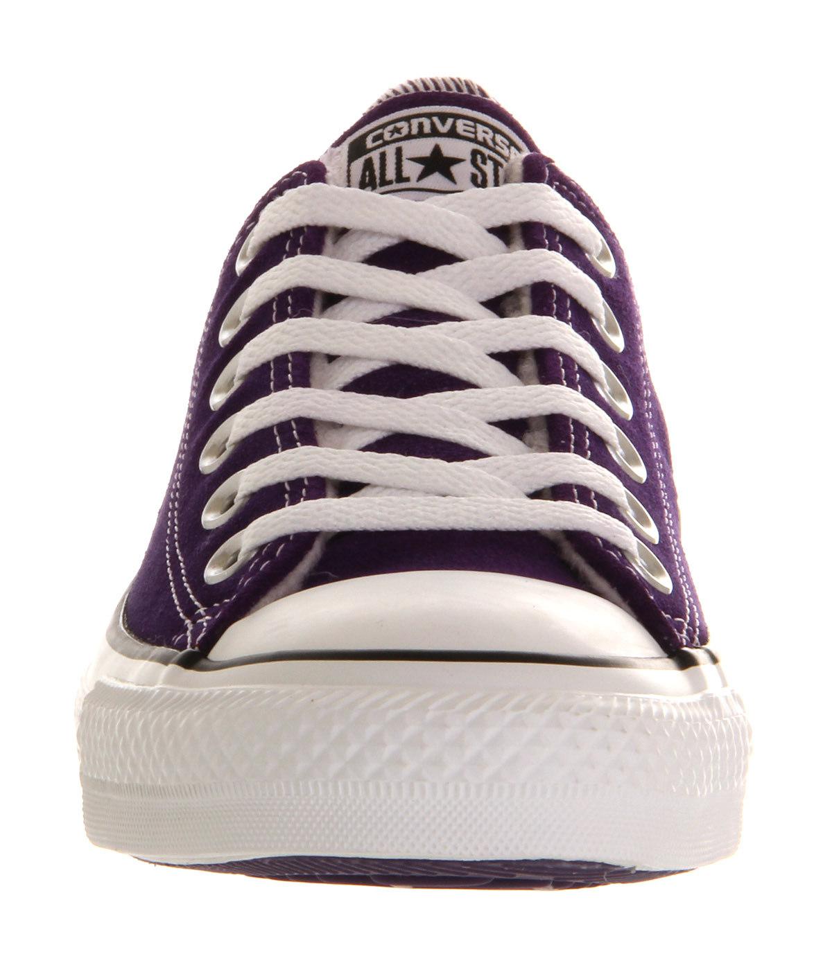 purple low cut converse