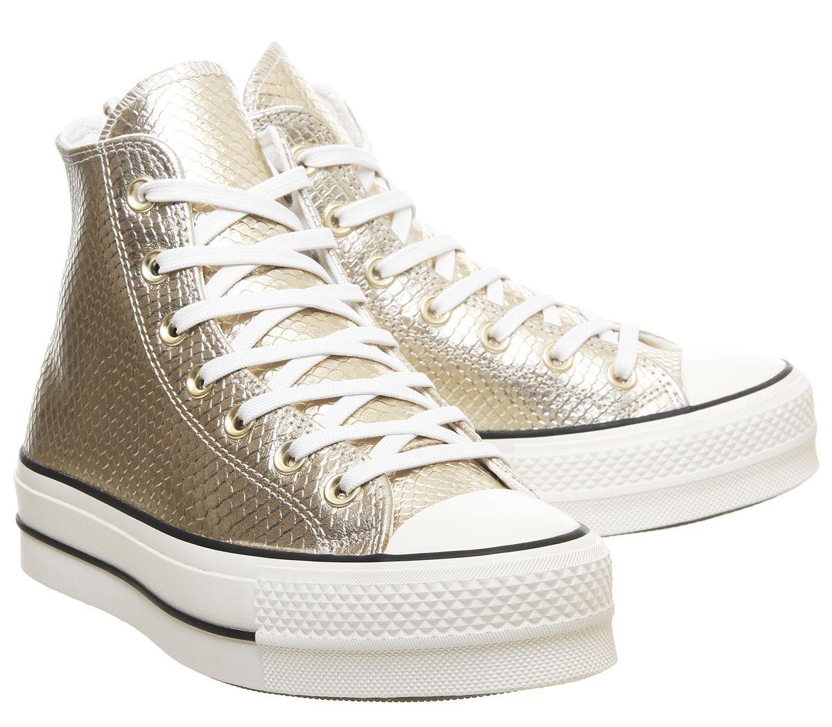 gold converse trainers