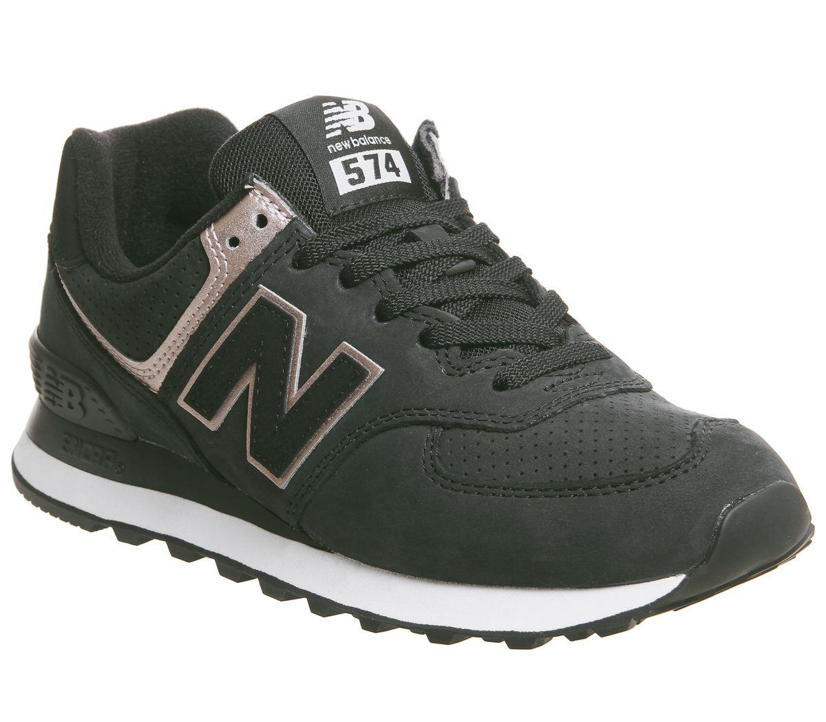 new balance black & gold 574 suede trainers