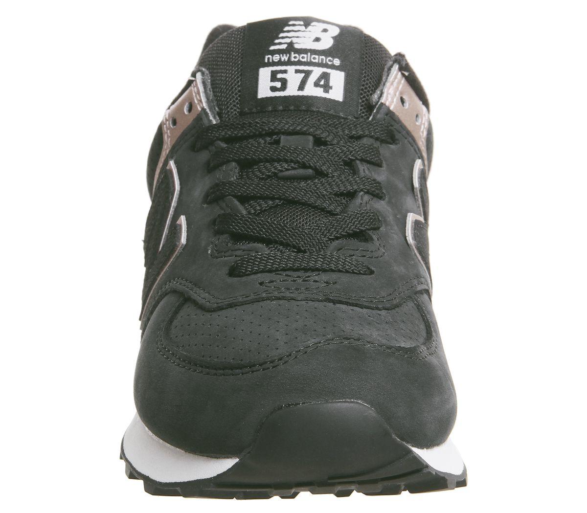 black & gold 574 suede trainers