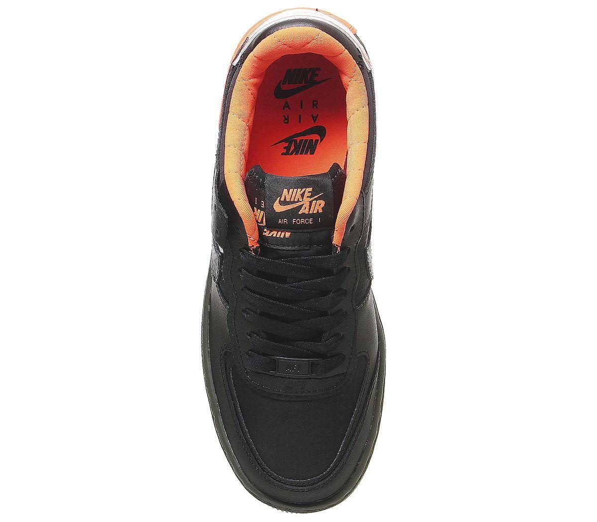 black and orange trainers