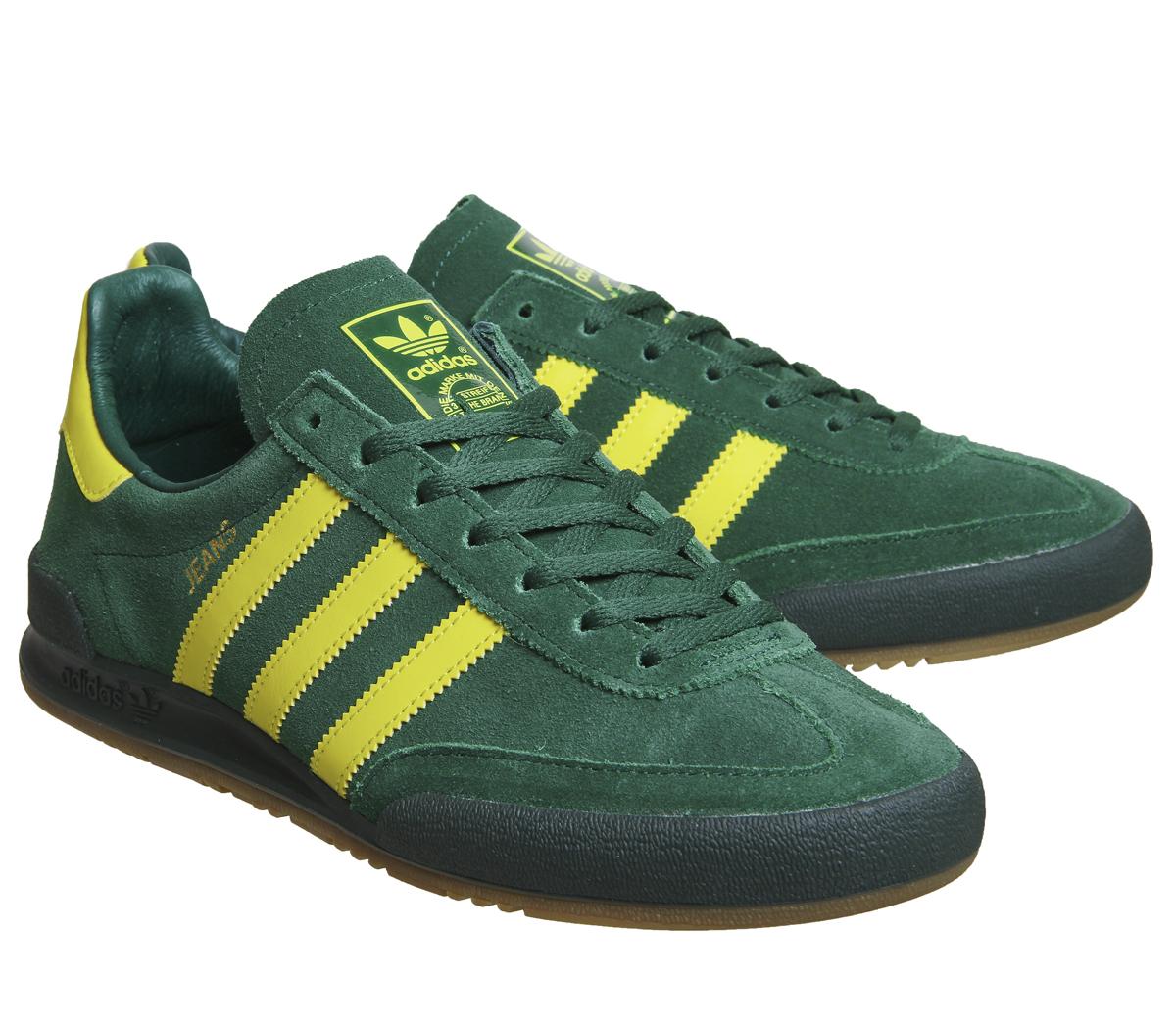 green and yellow adidas jeans
