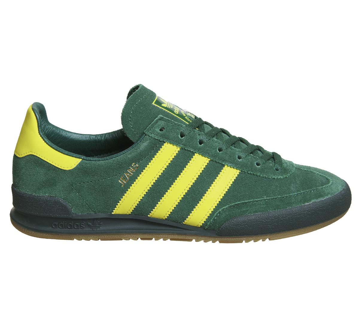 green and yellow adidas jeans