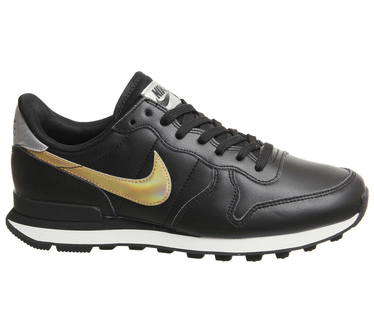 nike black and gold internationalist trainers