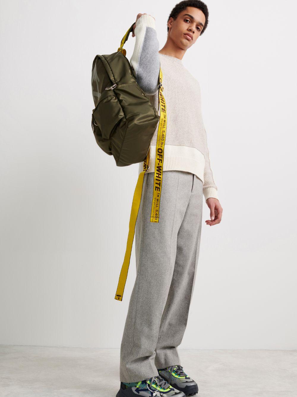 green arrow backpack