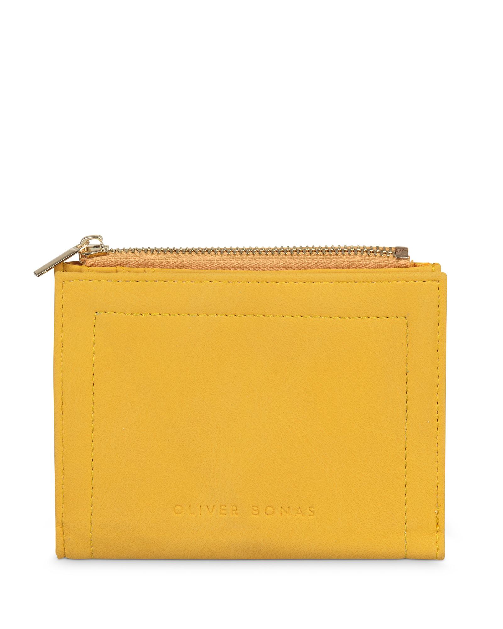 oliver bonas yellow purse