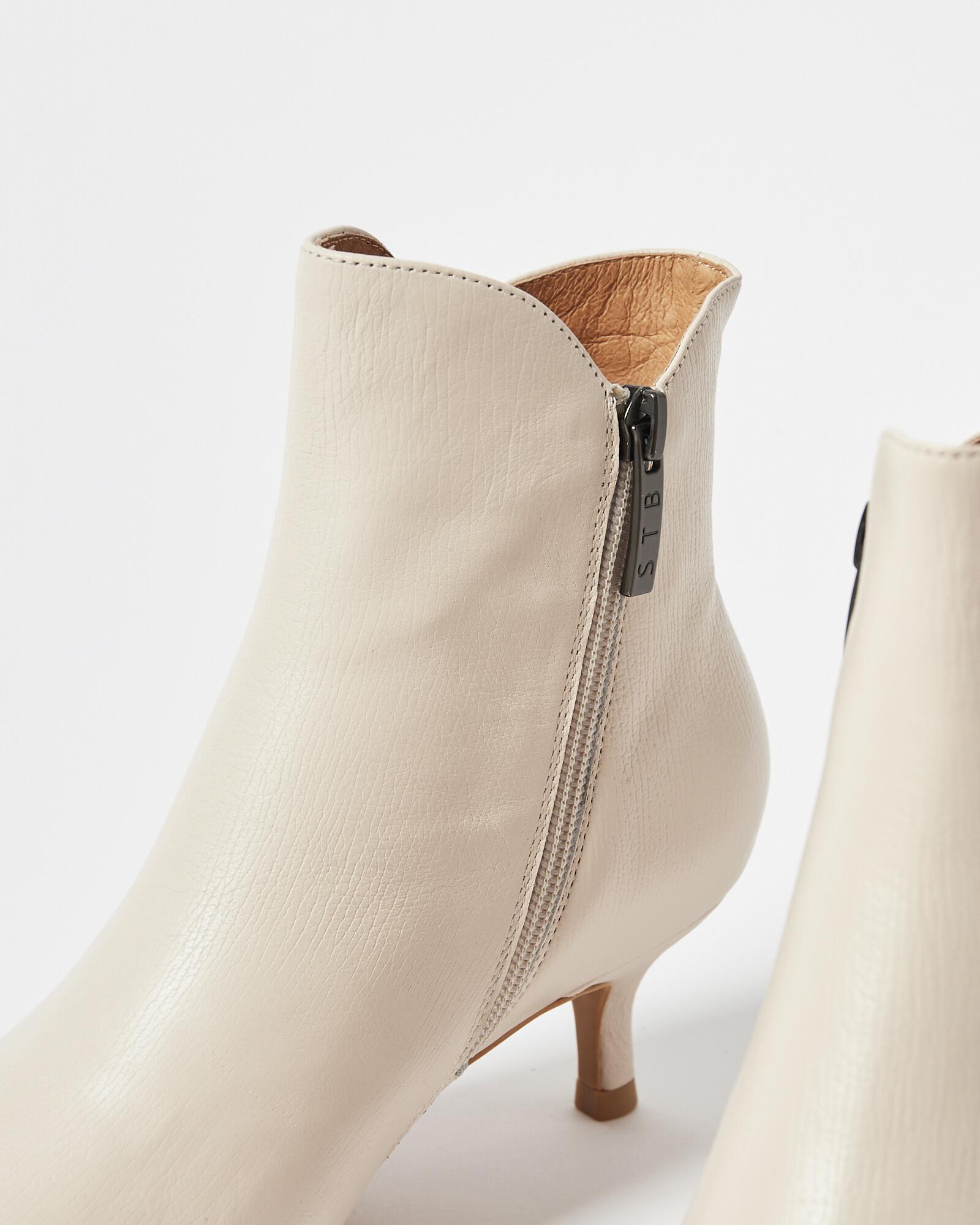 Cream shoe sales boots uk