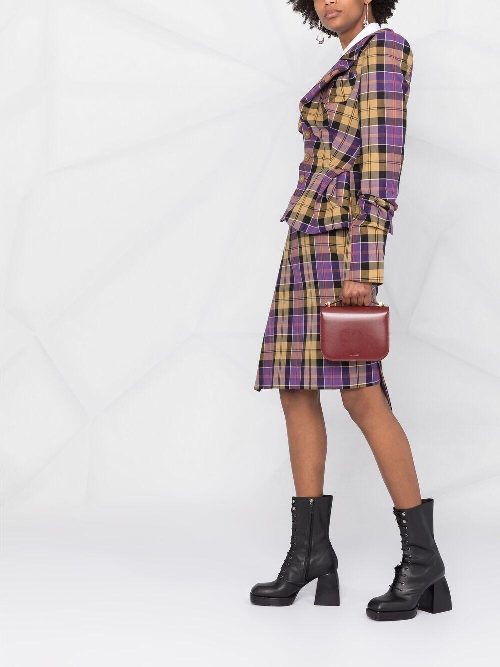 Tartan skirt crossword clue cheap
