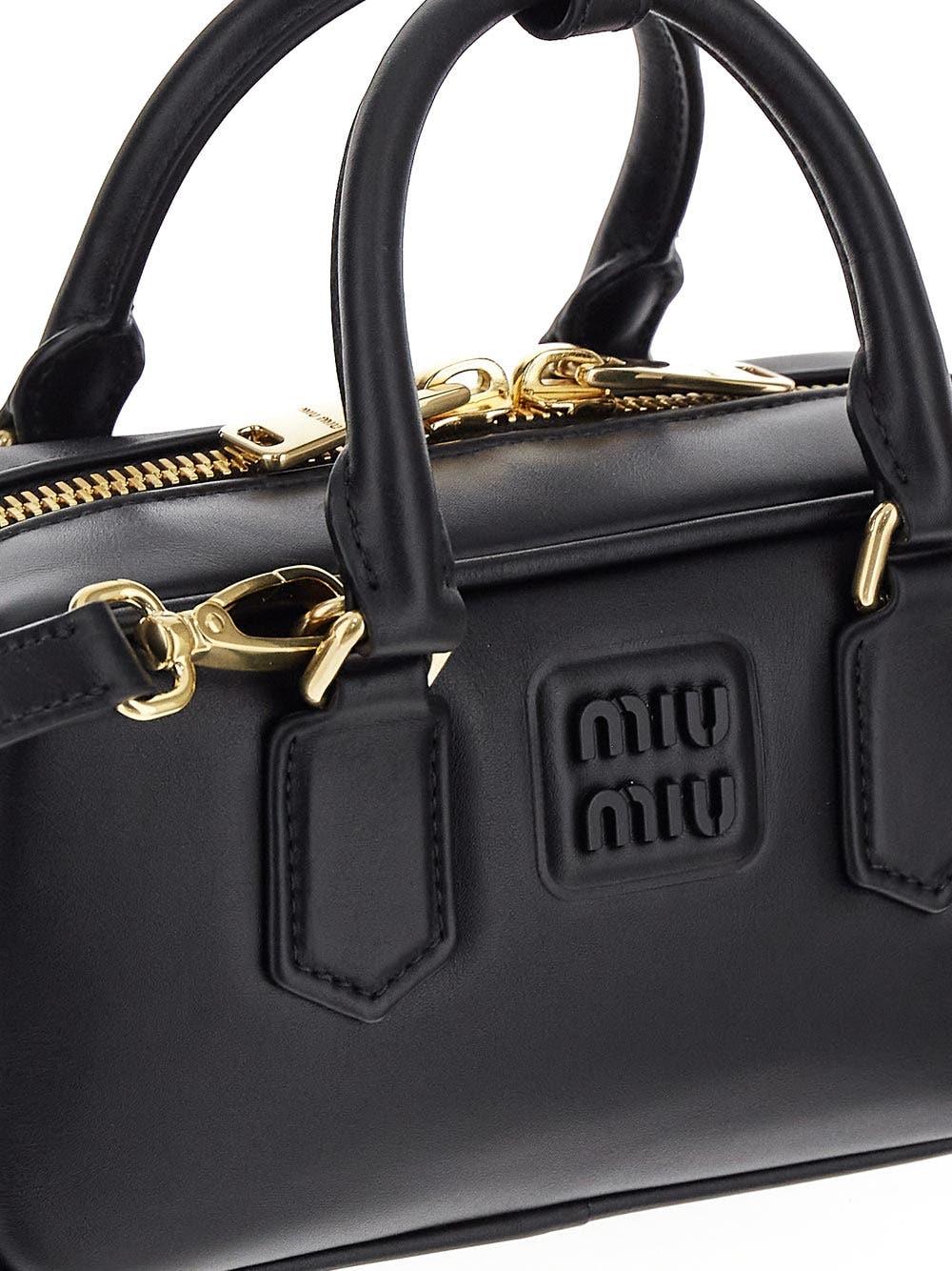 Miu Miu Leather Top-handle Bag in Black | Lyst UK