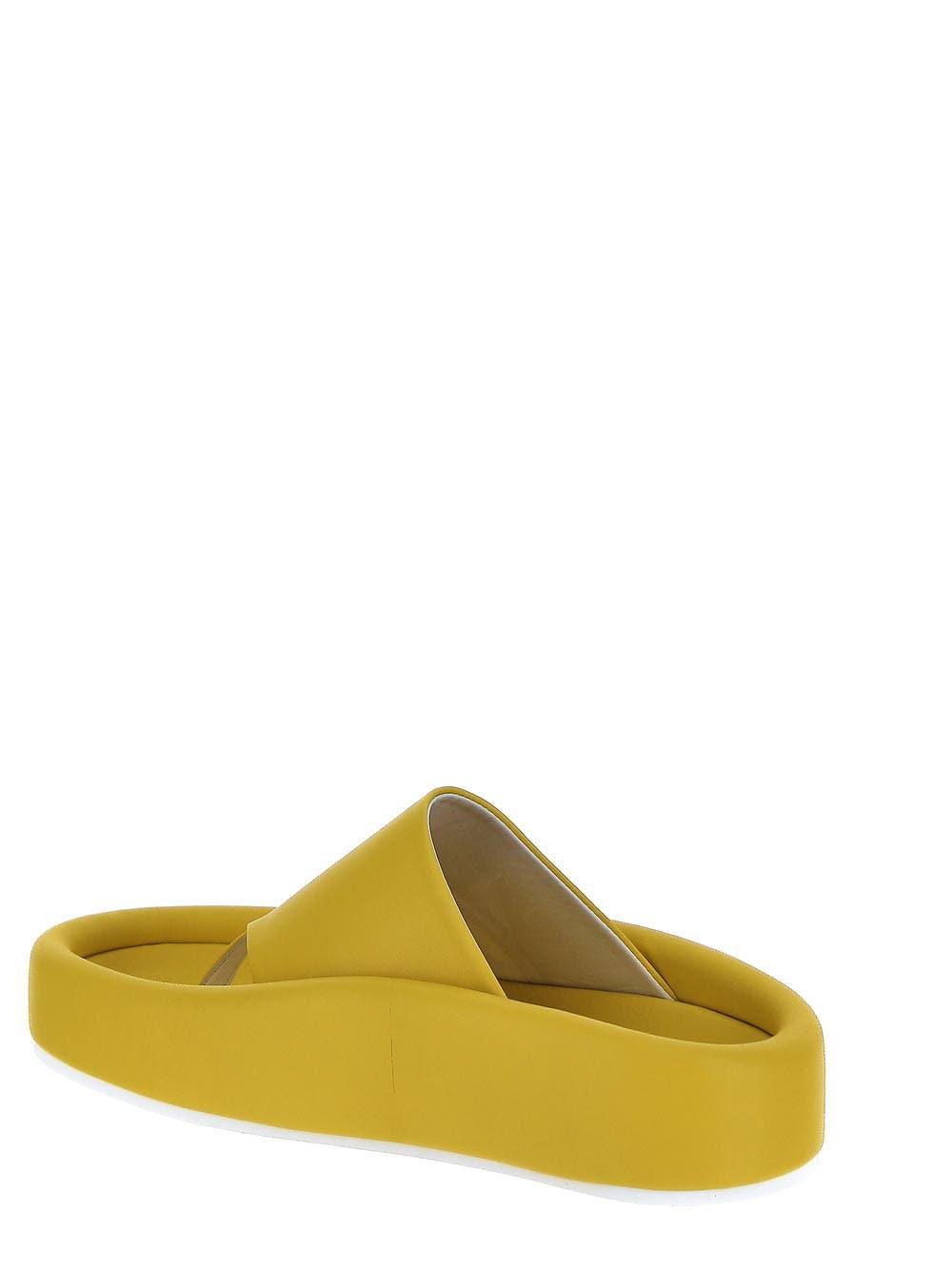 yellow leather flip flops
