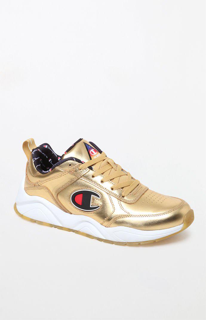 gold champion shoes