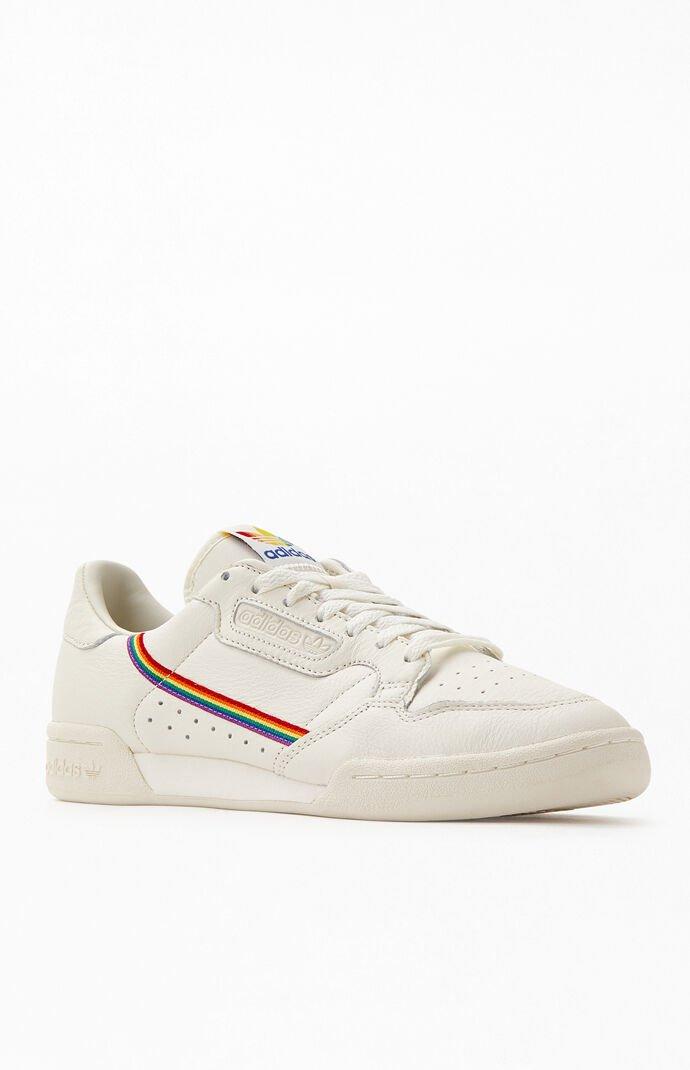 white adidas with rainbow stripes