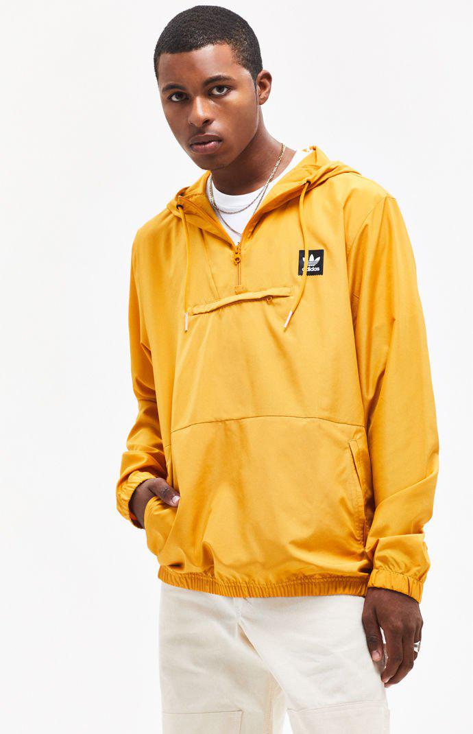 adidas hip packable jacket yellow