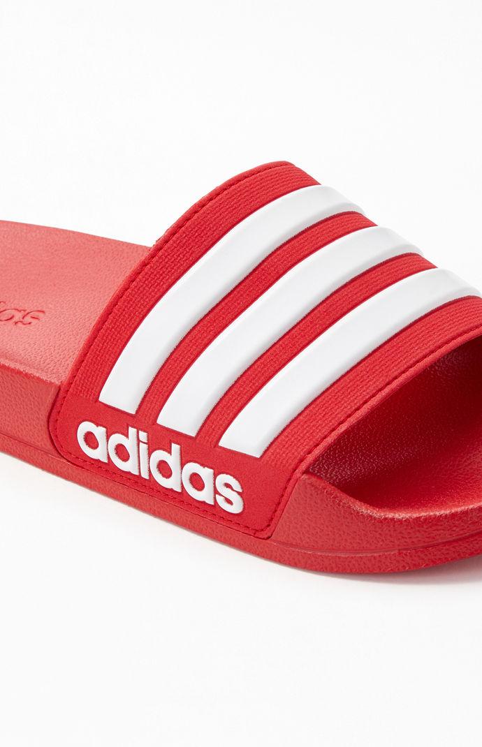 red and white adidas flip flops