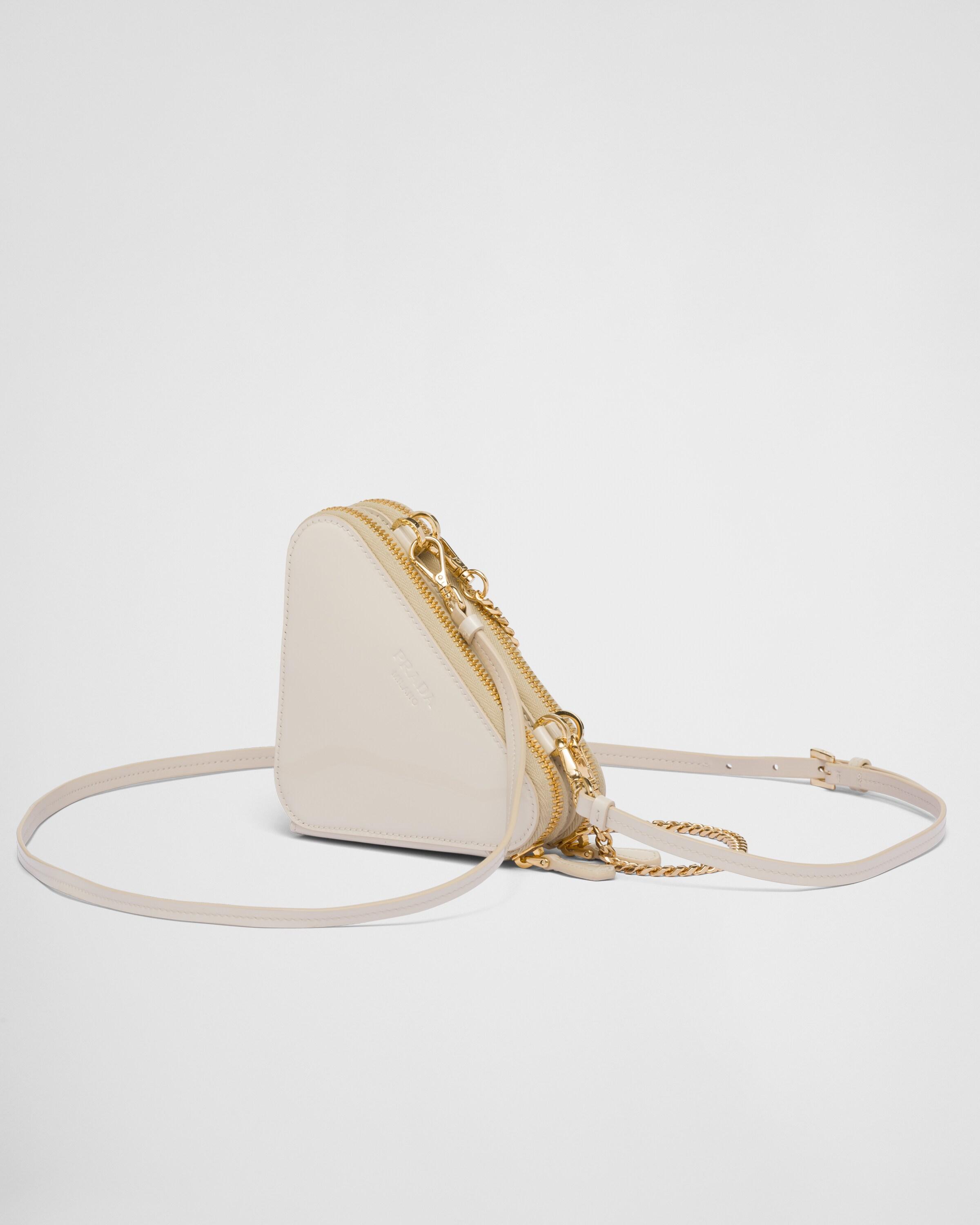 ショルダーバッグ・ポシェット PRADA TRIANGULAR PATENT LEATHER MINI BAG Prada Triangular Patent Leather Mini Pouch | Saks Fifth Avenue