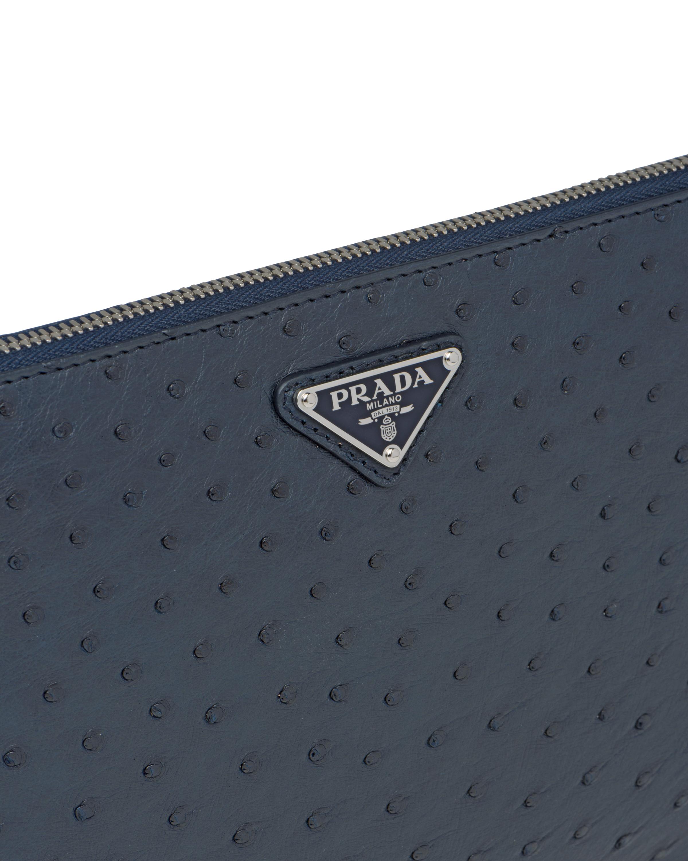 prada logo plaque clutch bag