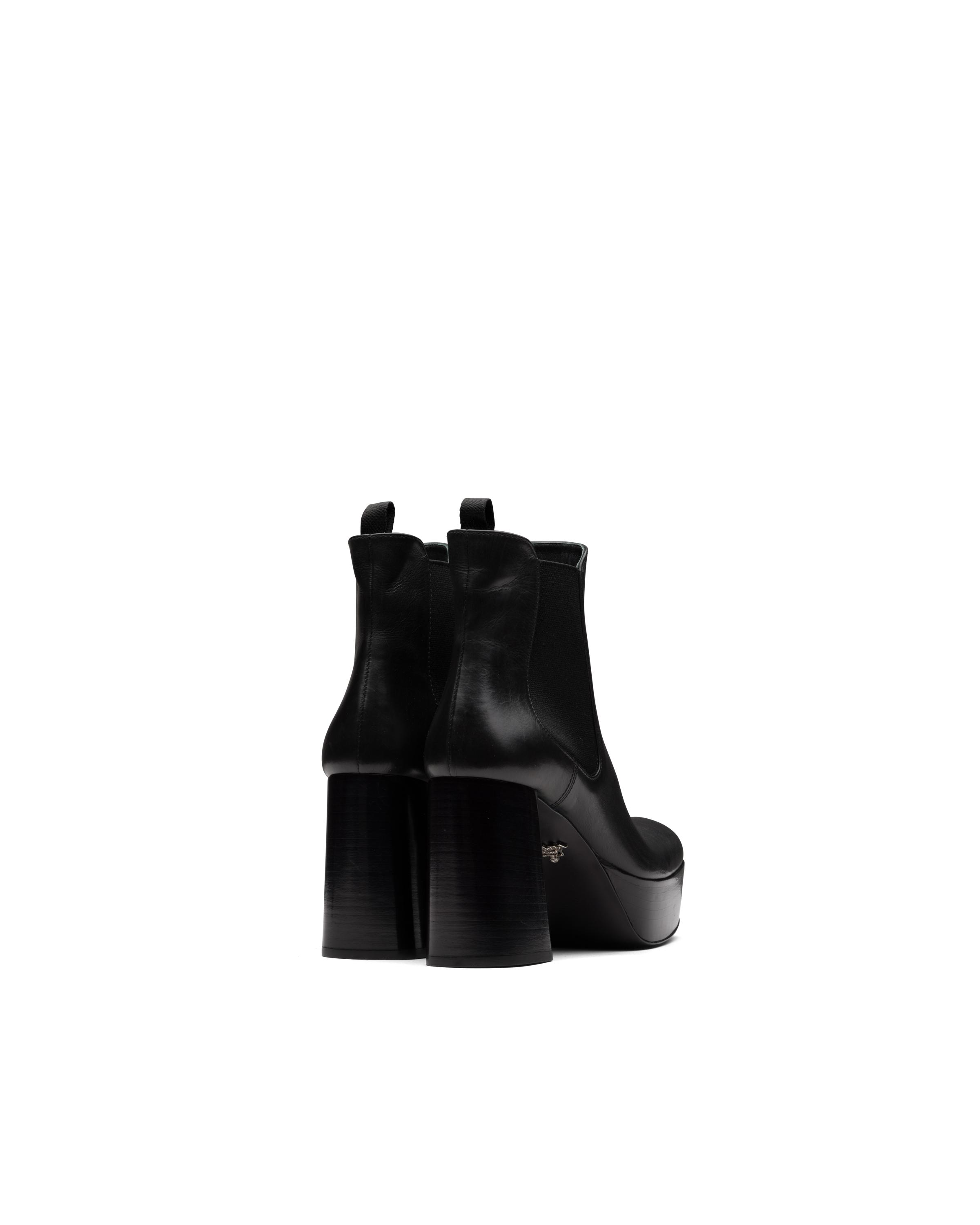 black leather platform booties