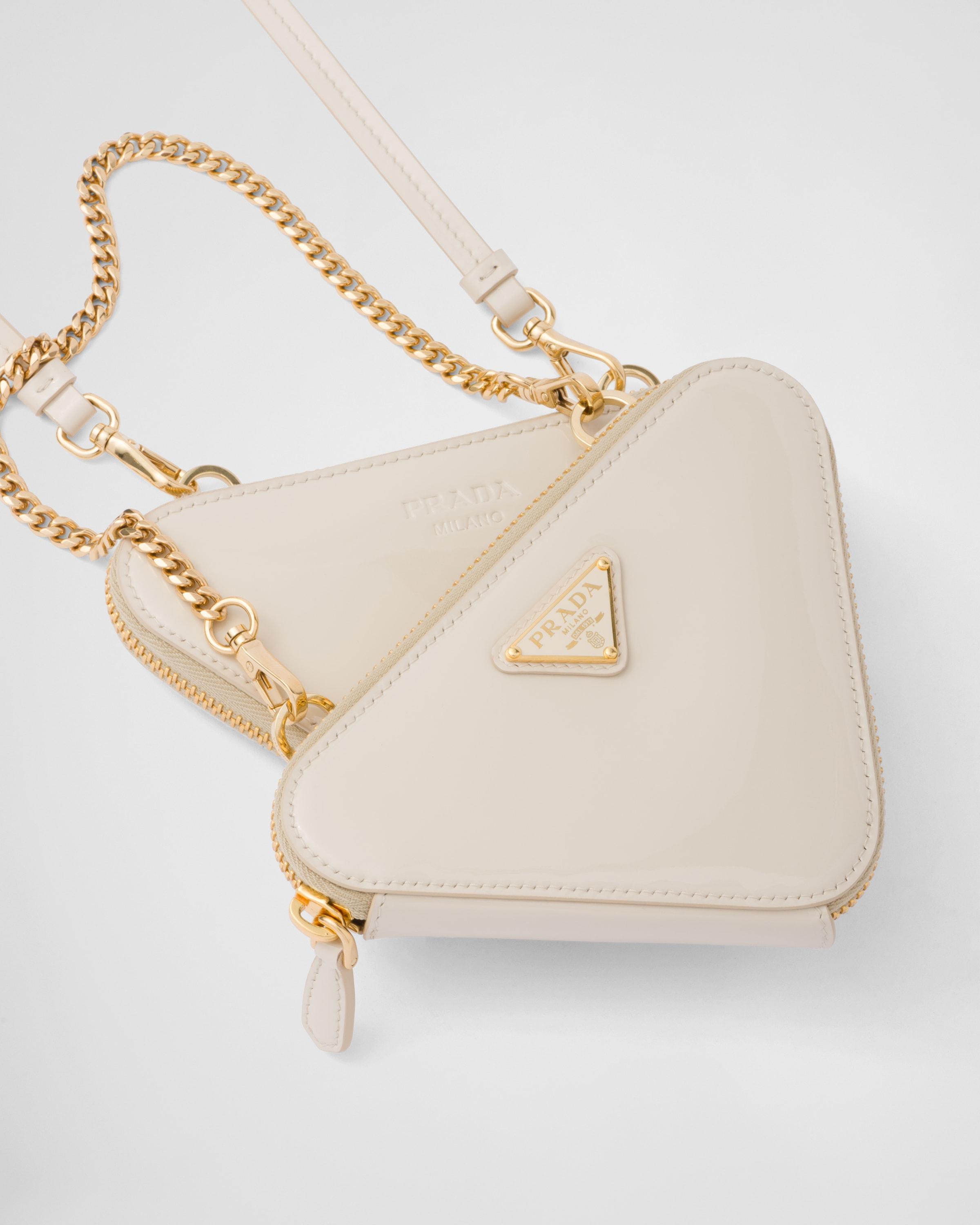 Prada Triangular Patent Leather Mini Pouch in White | Lyst