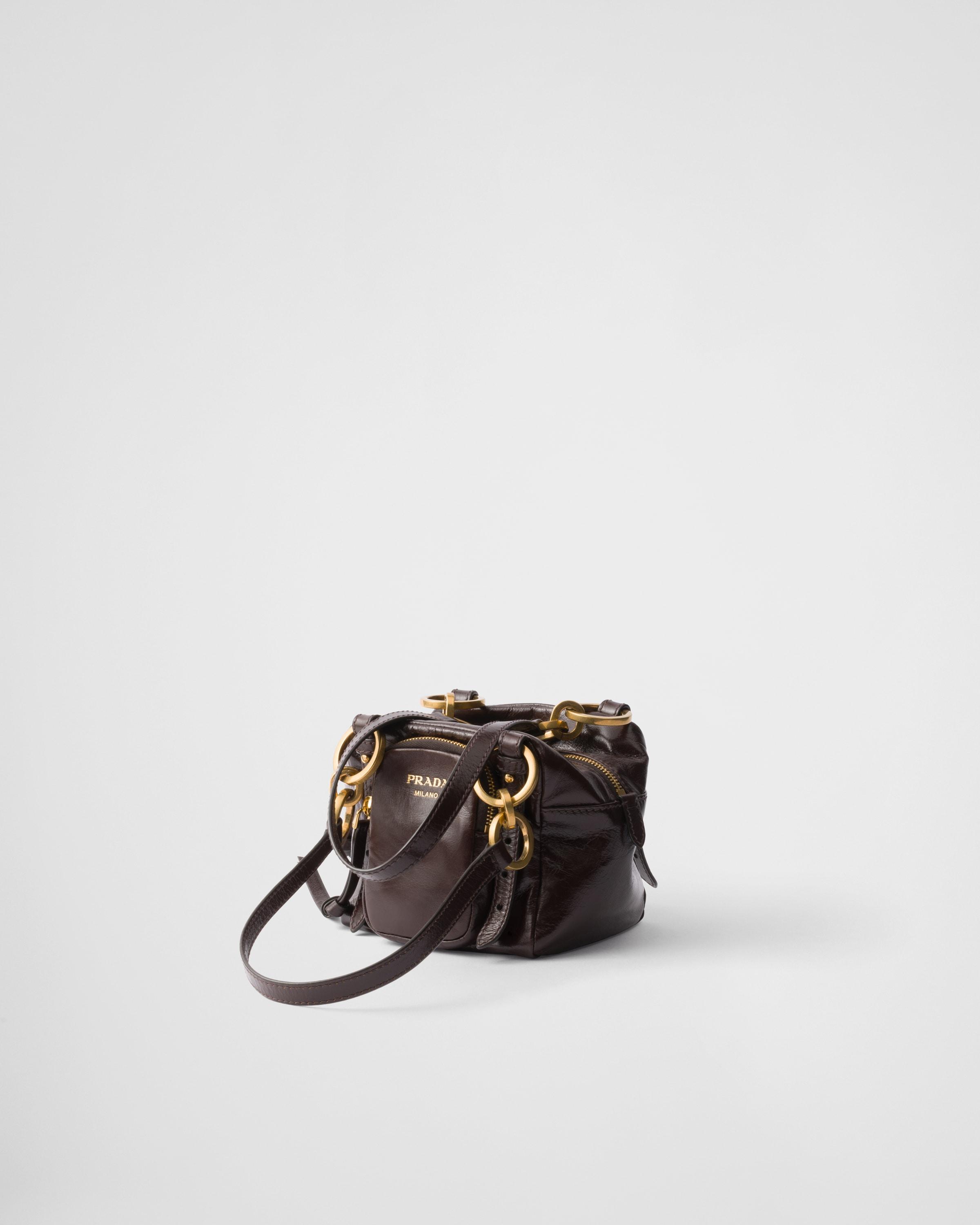 PRADA 大人気 DANGLE MINI LEATHER TOP HANDLE 関・送無 Black Prada Dangle leather top-handle mini-bag | PRADA