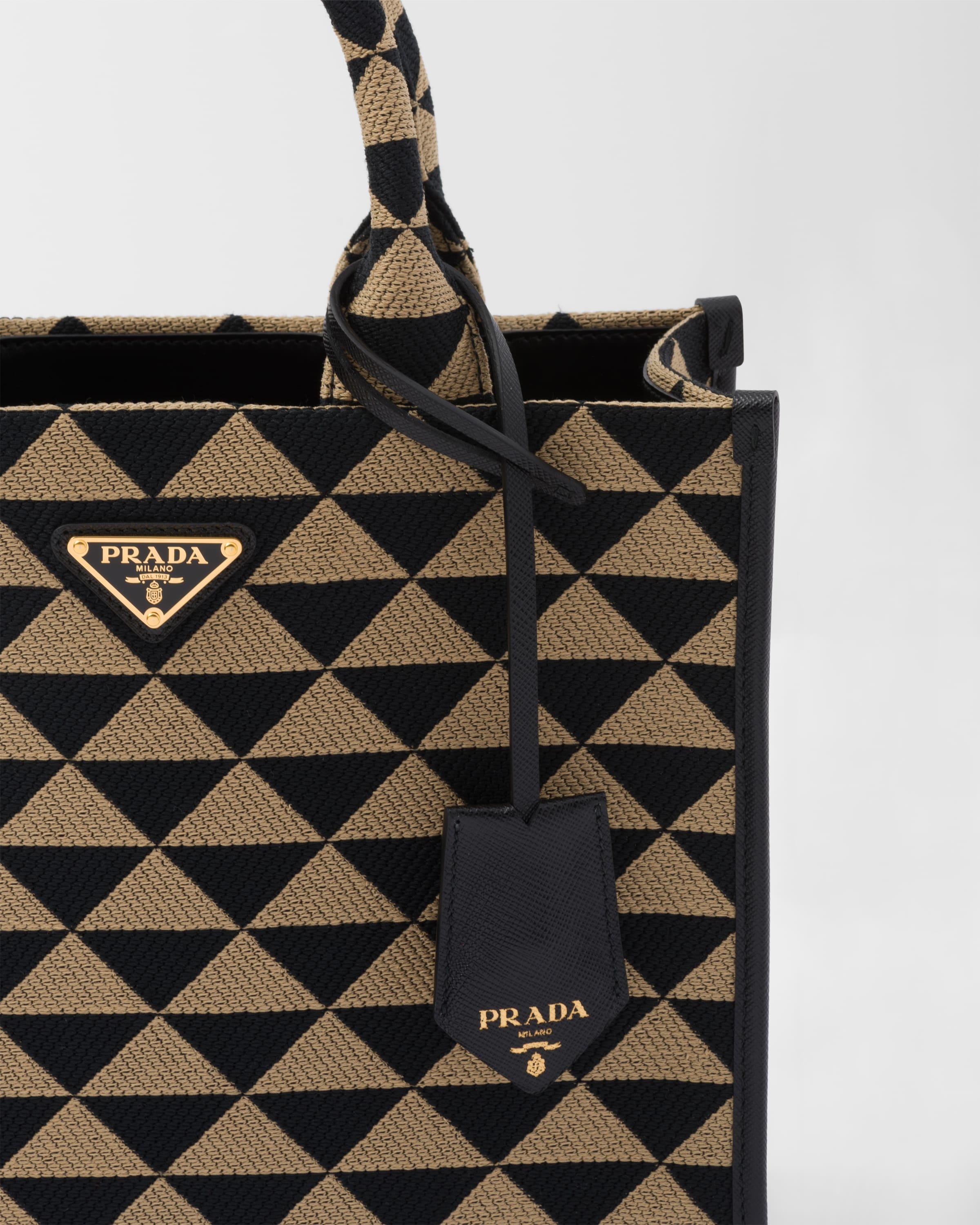 Prada Small Symbole Embroidered Fabric Handbag in Black | Lyst