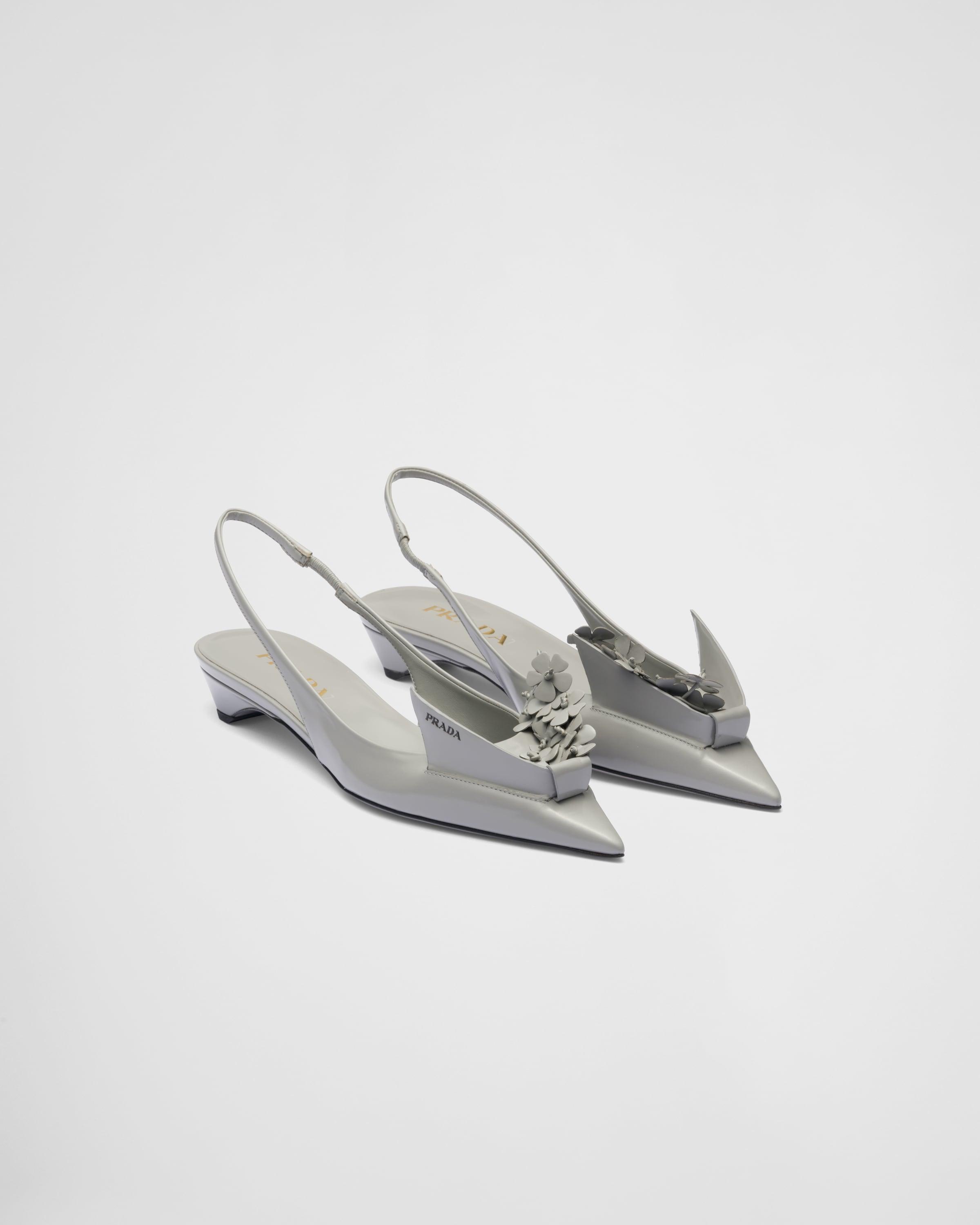 Prada Brushed Leather Slingback Pumps With Floral Appliques Prada Brushed Leather Slingback Pumps With Floral Appliques