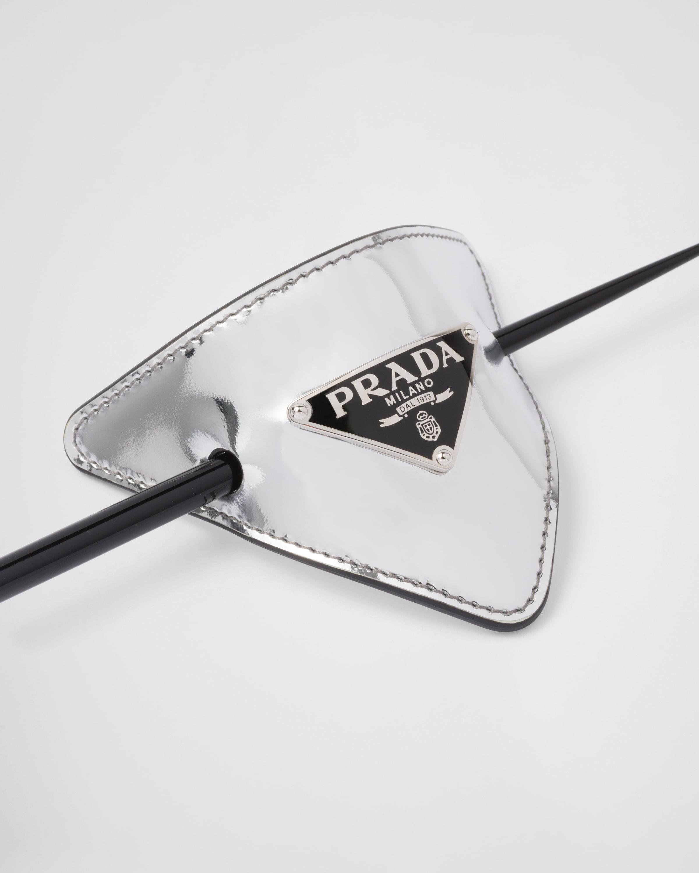 prada leather hair clip