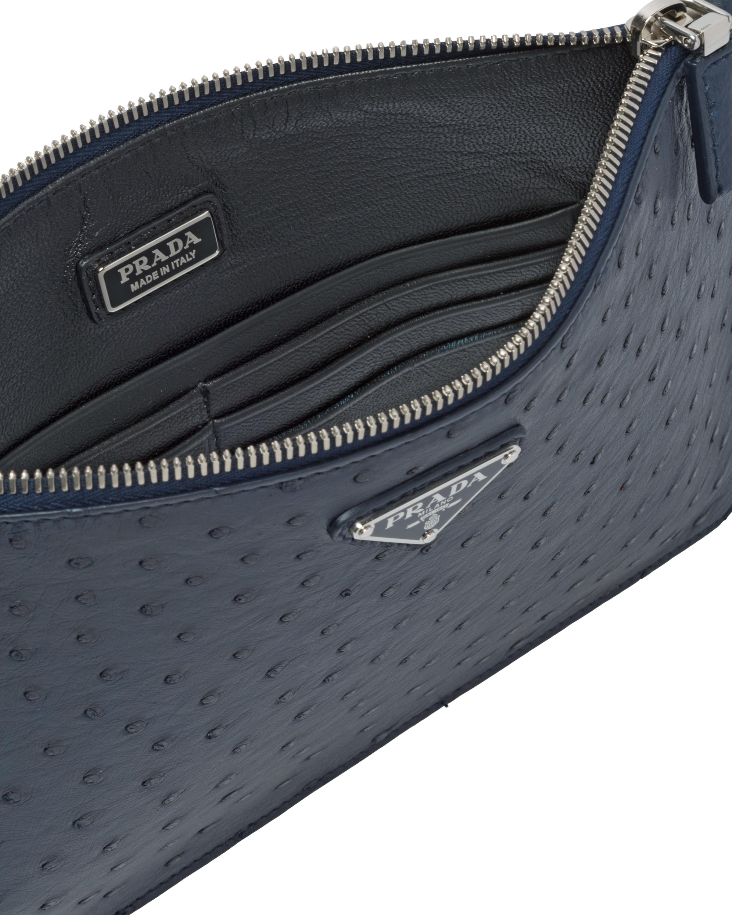 prada logo plaque clutch bag