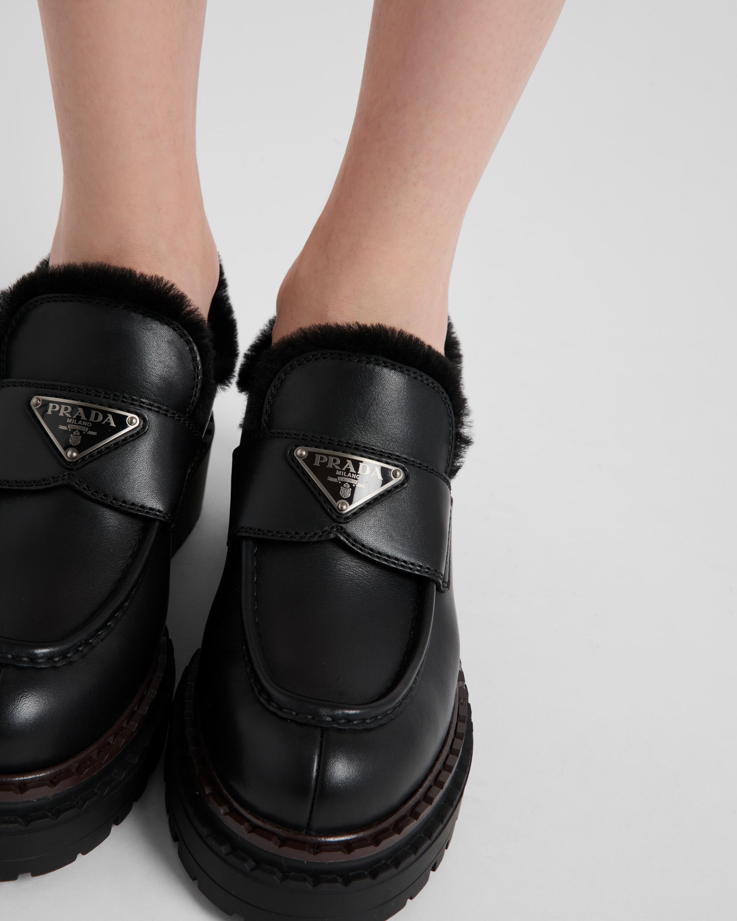 Prada Double Chocolate Leather And Shearling Loafers in Black Lyst