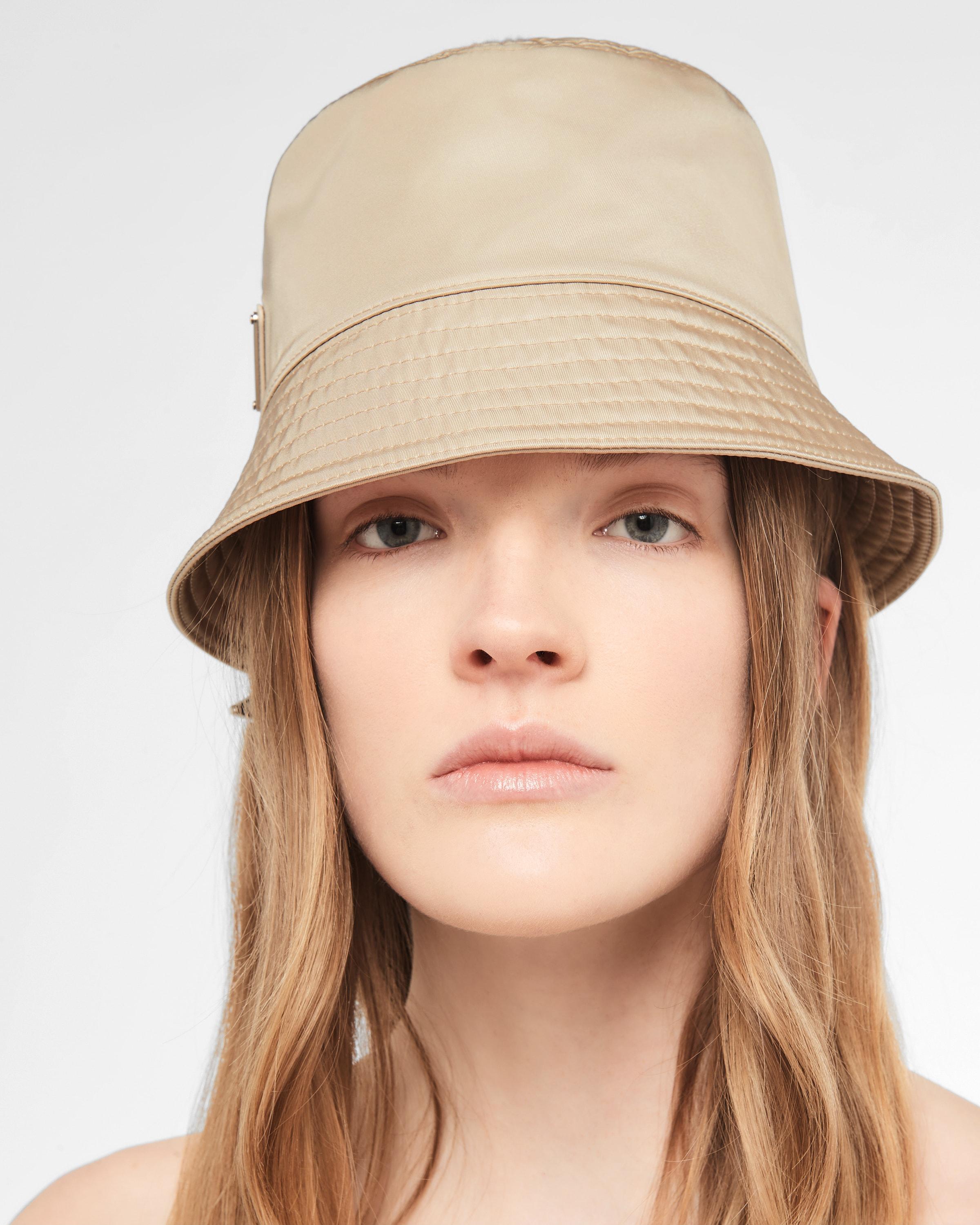 beige prada bucket hat