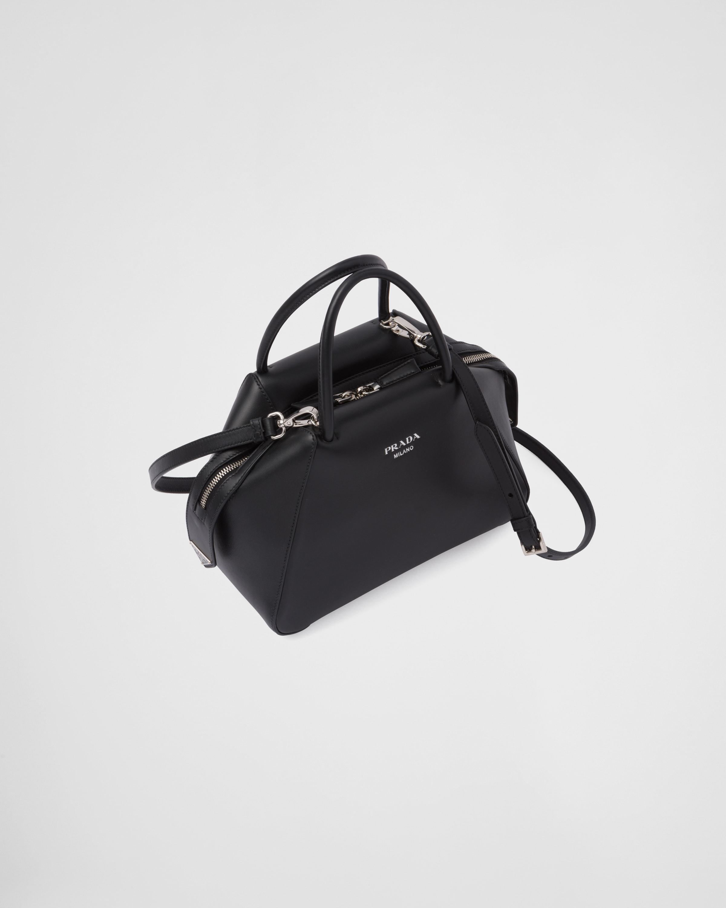 Prada Small Leather Supernova Handbag in Black | Lyst