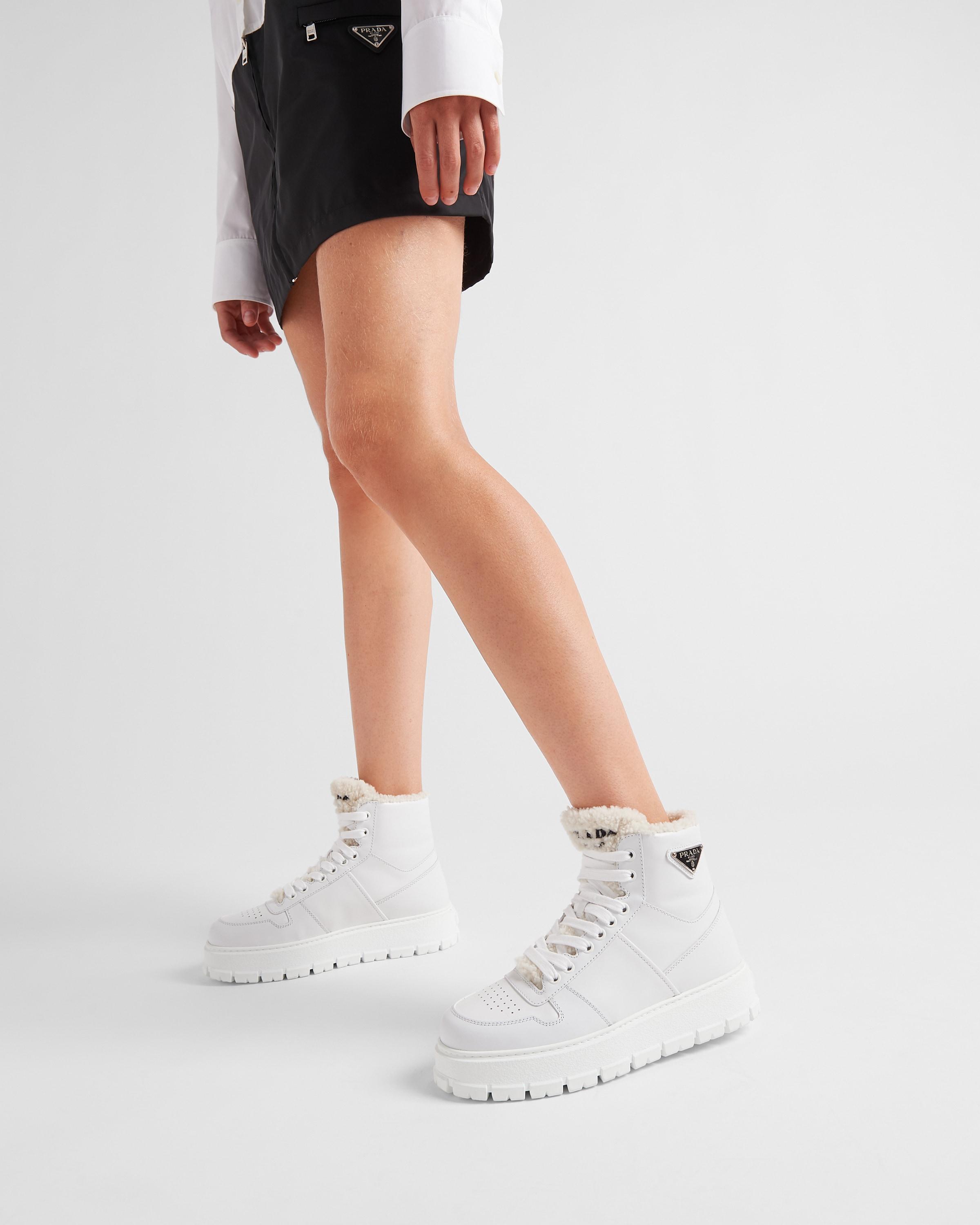 Prada Leather And Shearling High-top Sneakers in White | Lyst