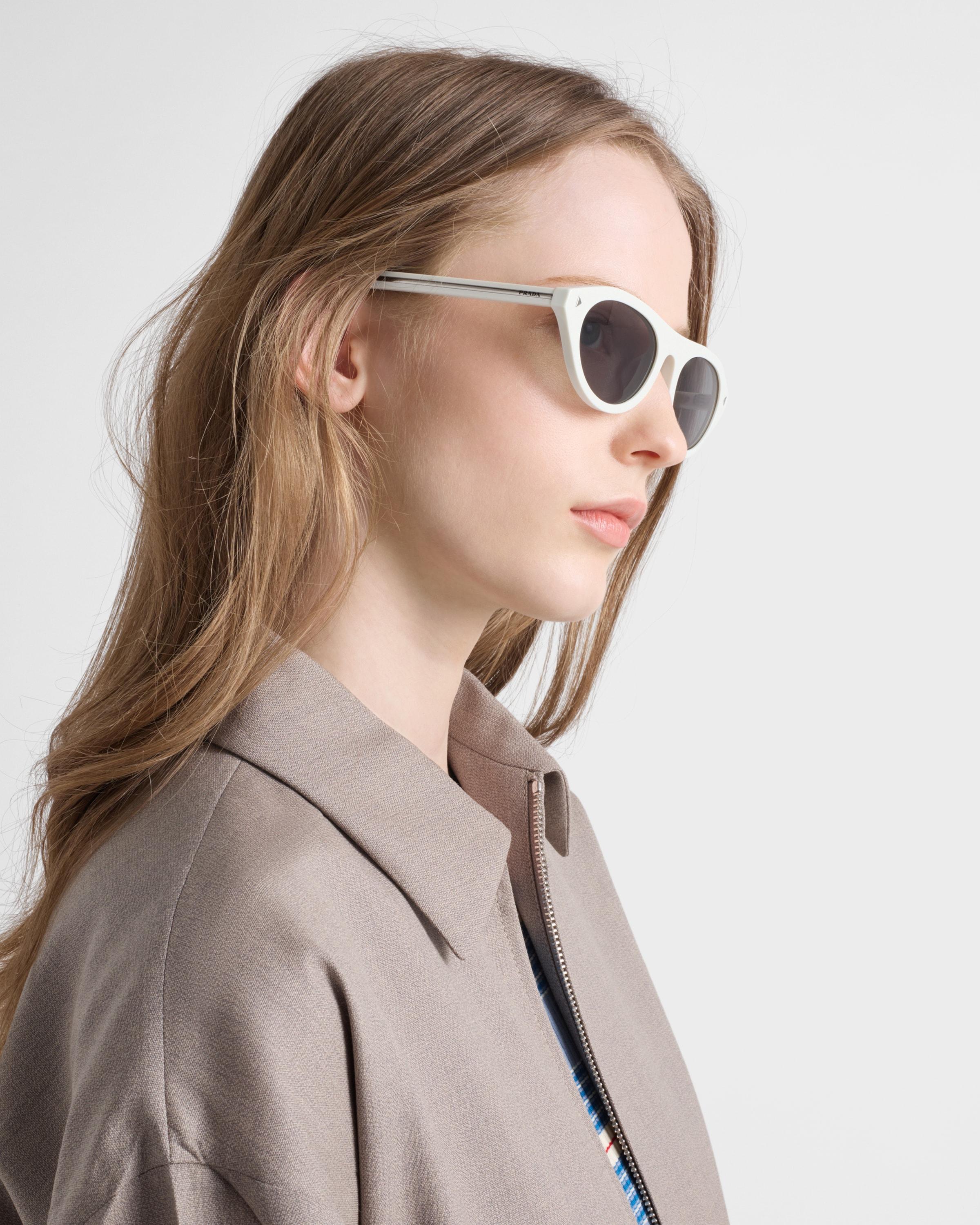 Prada Sunglasses With The Iconic Metal Plaque in White | Lyst