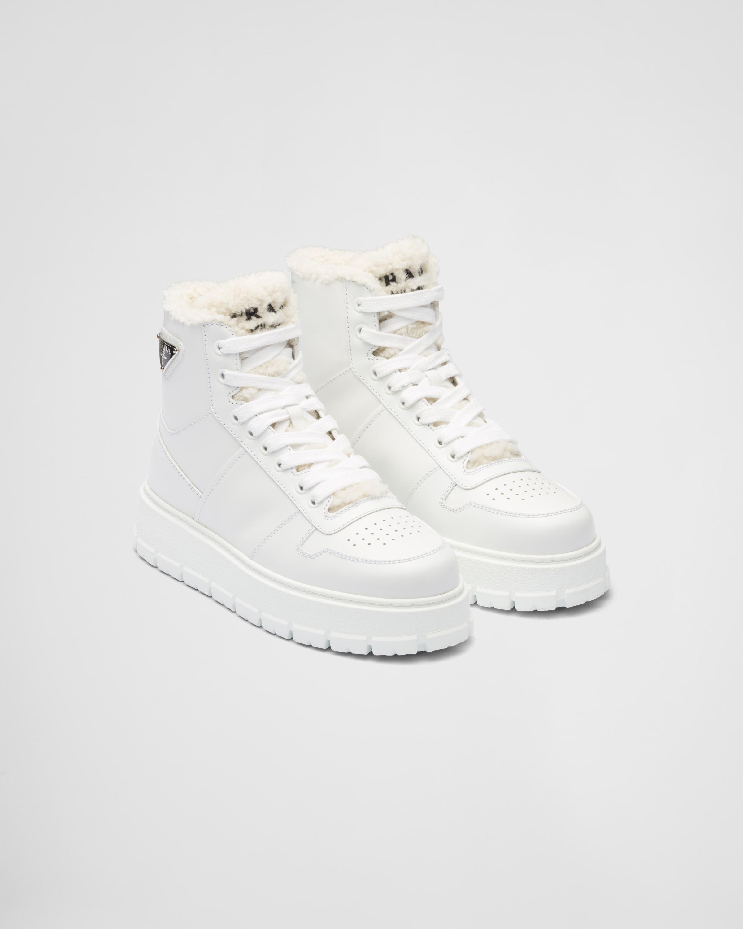 Prada Leather And Shearling High-top Sneakers in White