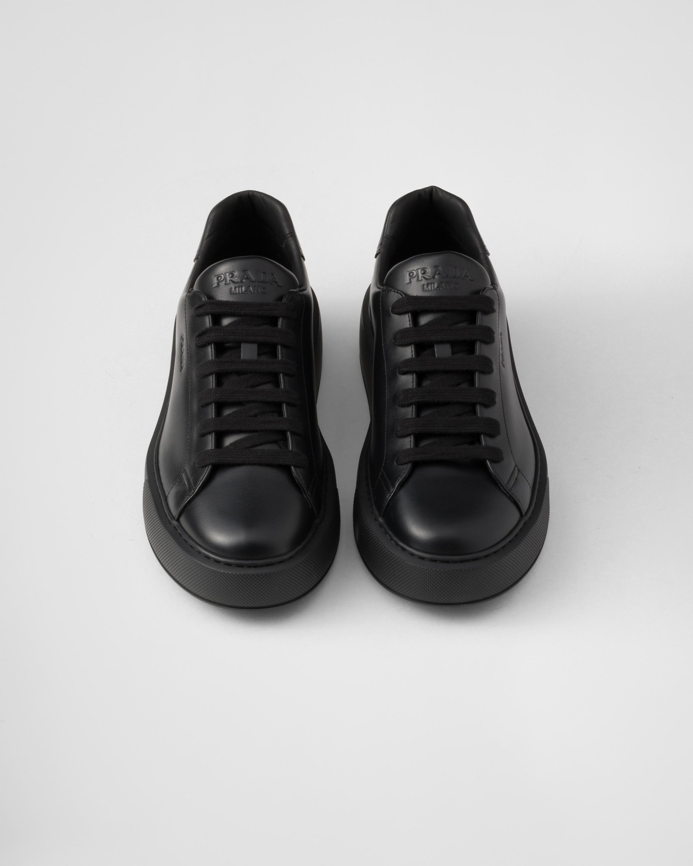 Prada black leather sneakers hotsell